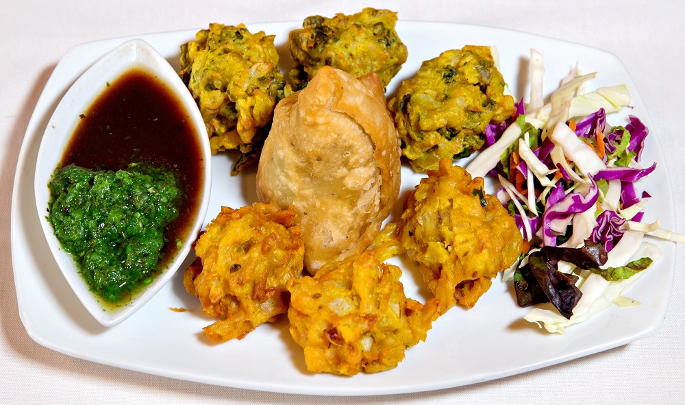Order Vegetable Treat (V) food online from Rajput Indian Cuisine store, Suffolk on bringmethat.com