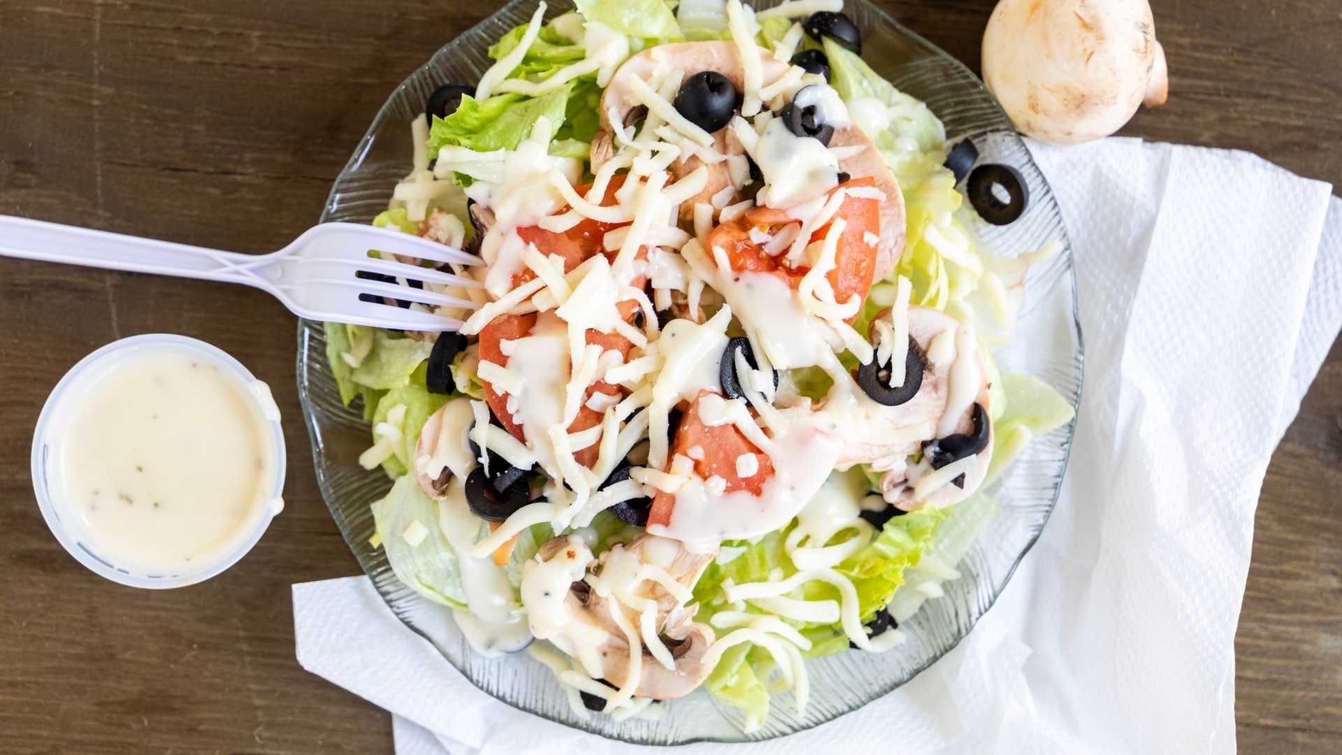 Order Tossed Green Salad - Small food online from Giovannis Pizza store, San Jose on bringmethat.com
