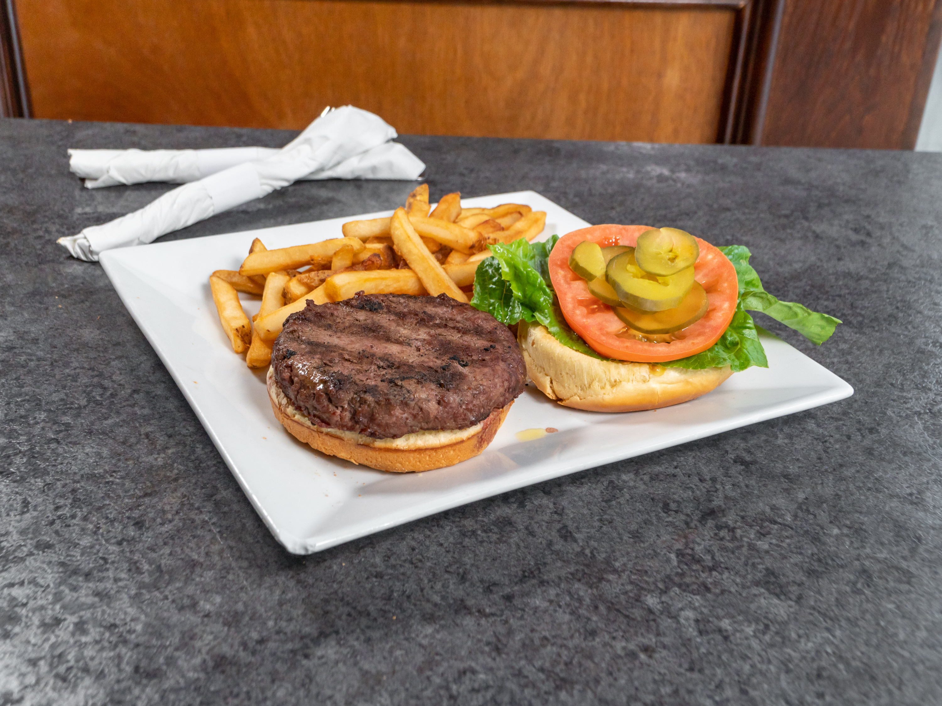 Order Burger food online from The Exchange Saloon store, Washington on bringmethat.com