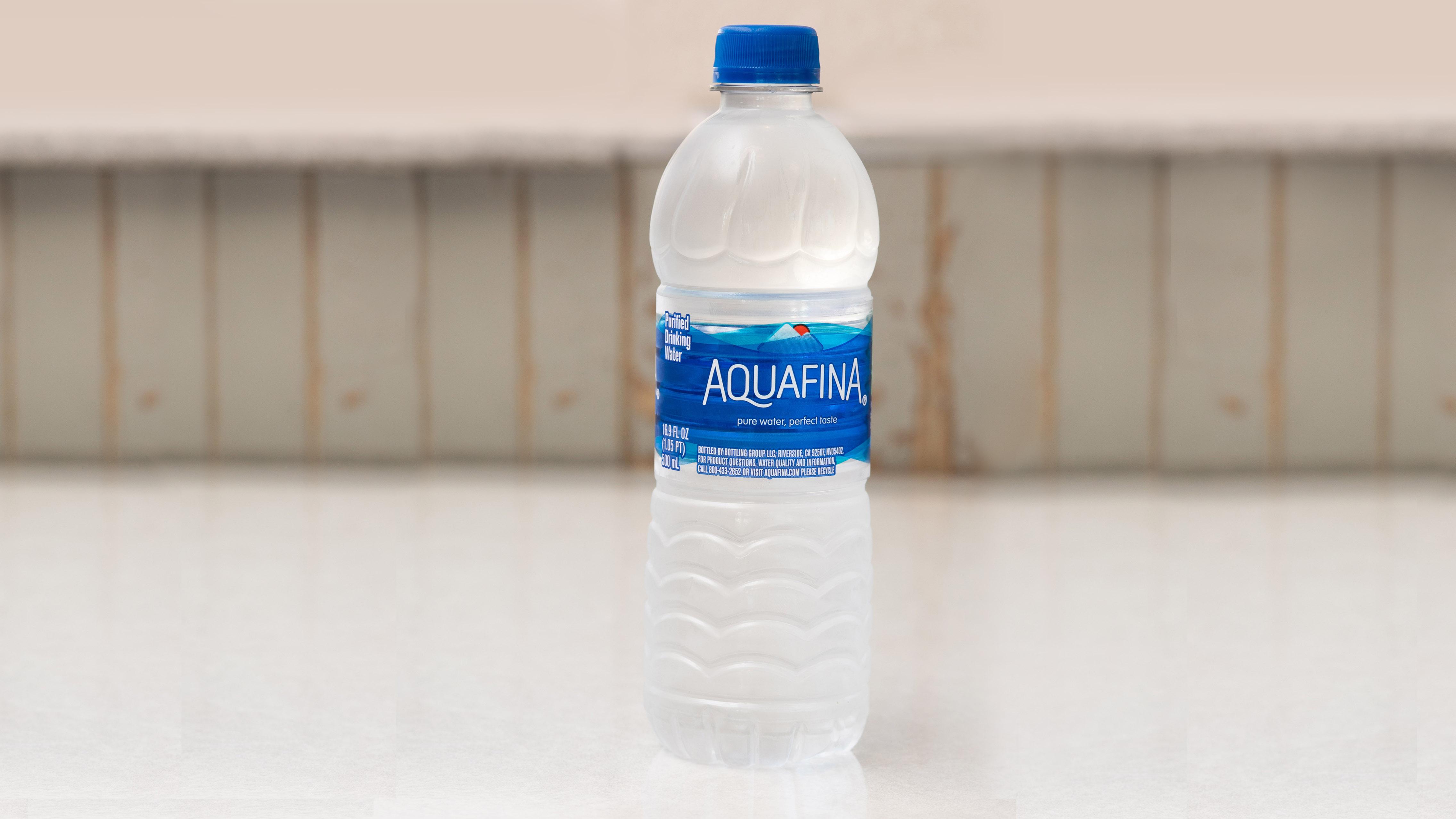 Order Aquafina Water (16.9 oz.) food online from Original Tommy's World Famous Hamburgers store, City of Industry on bringmethat.com