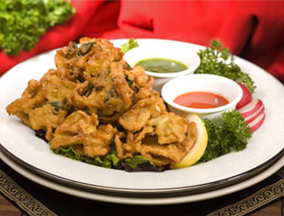 Order Mixed Vegetable Pakora food online from Taj Mahal Restaurant store, Wilmington on bringmethat.com