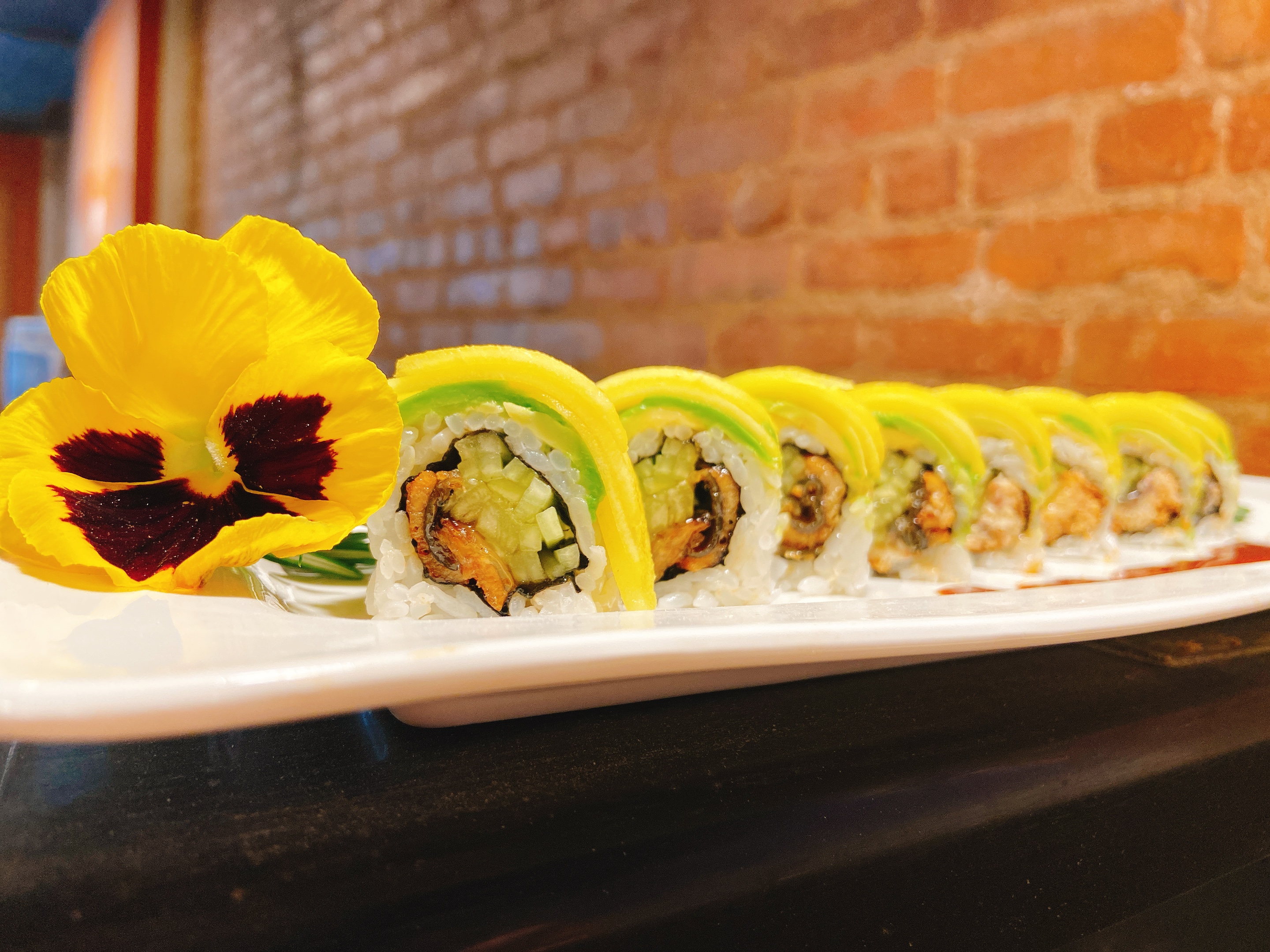 Order Mango Dragon Roll food online from Takashi Japanese Cuisine store, Morristown on bringmethat.com
