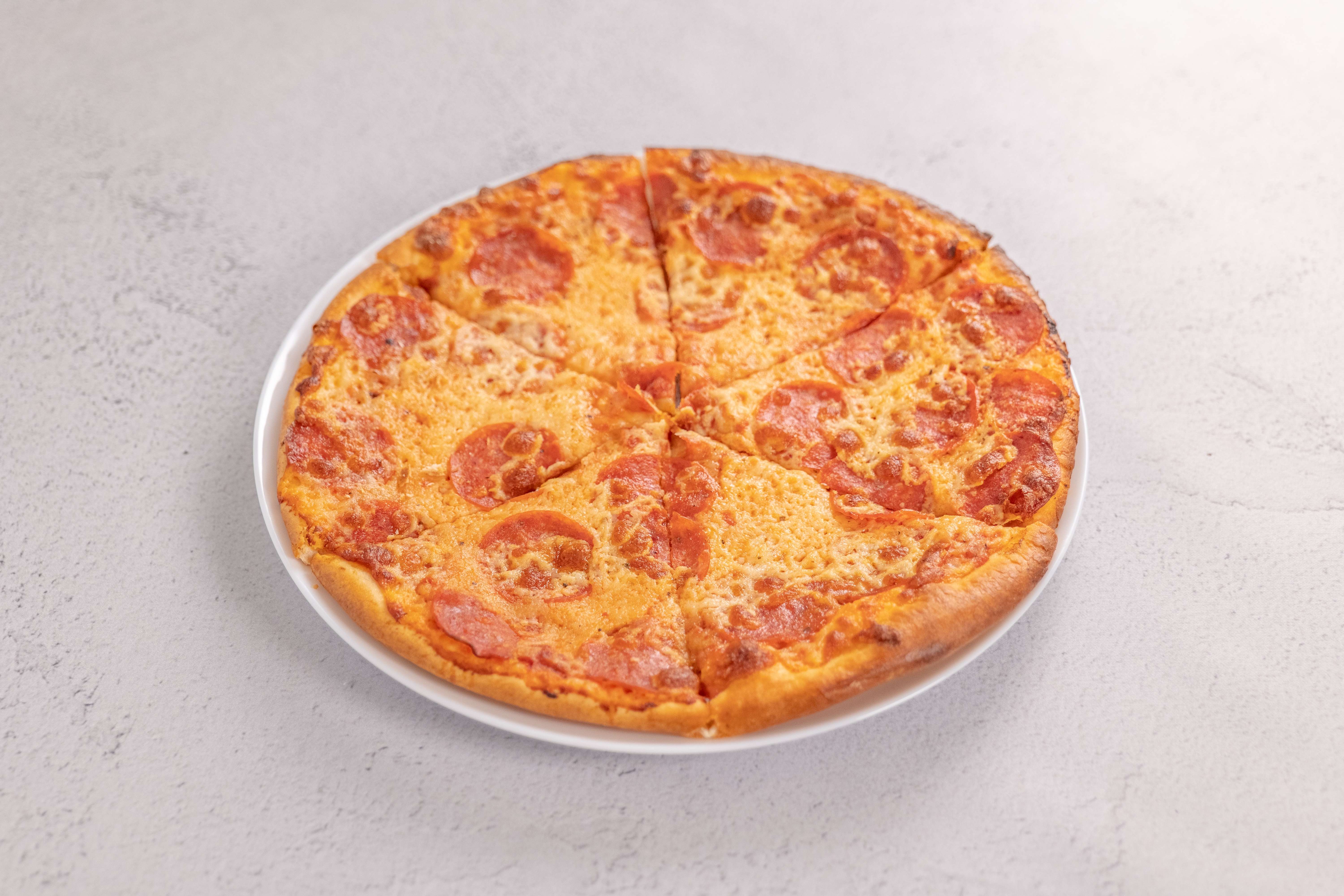 Order Pizza with 1 Toppings of Your Choice food online from Tony's Pizza store, San Fernando on bringmethat.com