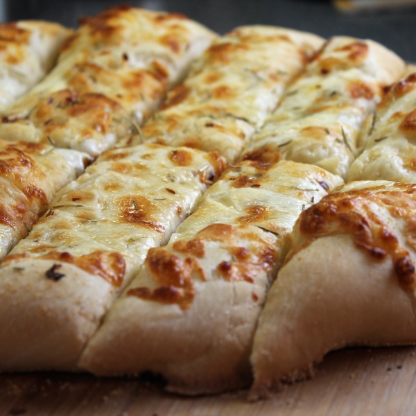 Order Garlic Bread with Cheese food online from Ameci Pizza & Pasta store, Granada Hills on bringmethat.com