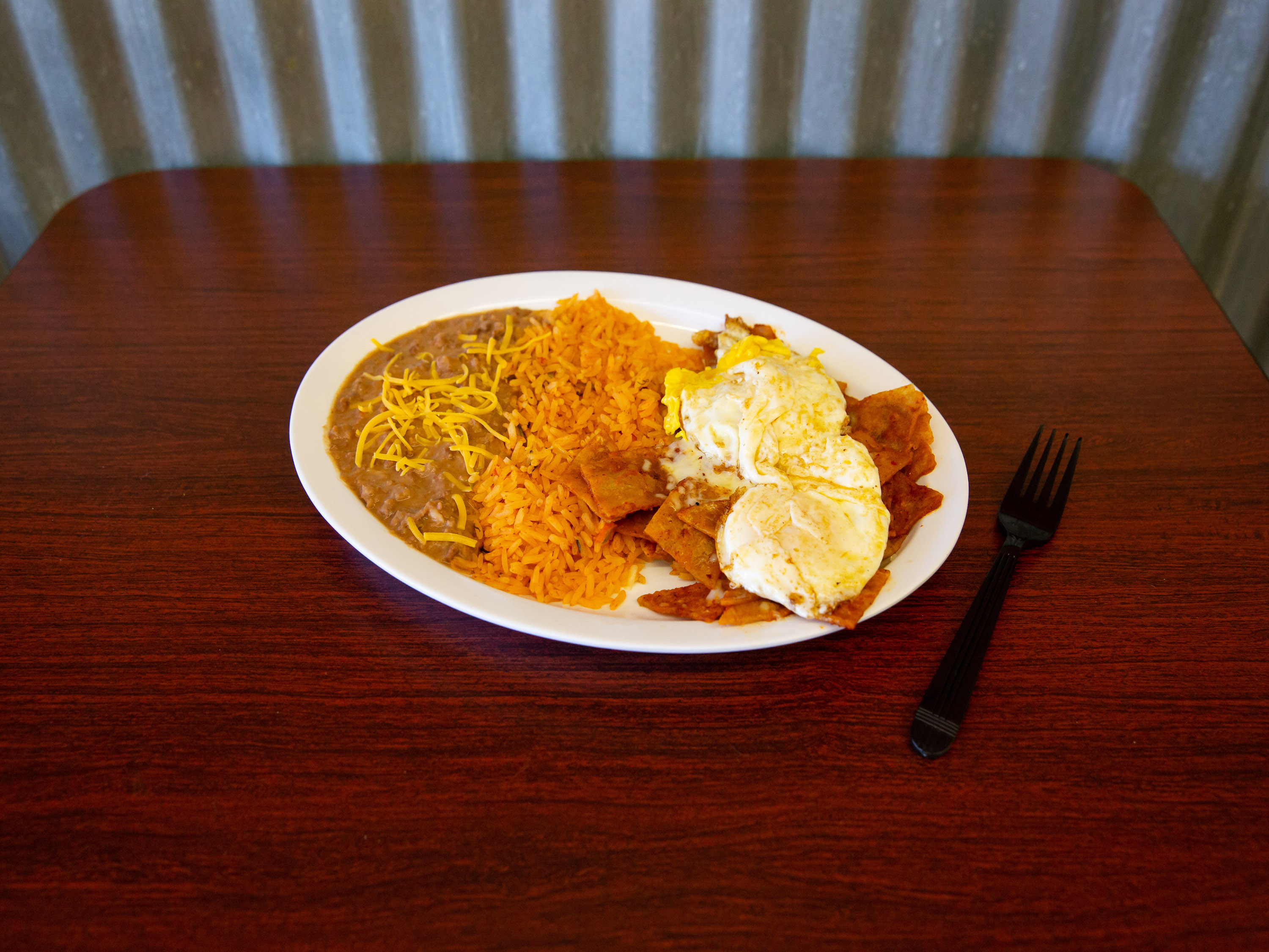 Order Chilaquiles Plate food online from Don Roman store, San Diego on bringmethat.com