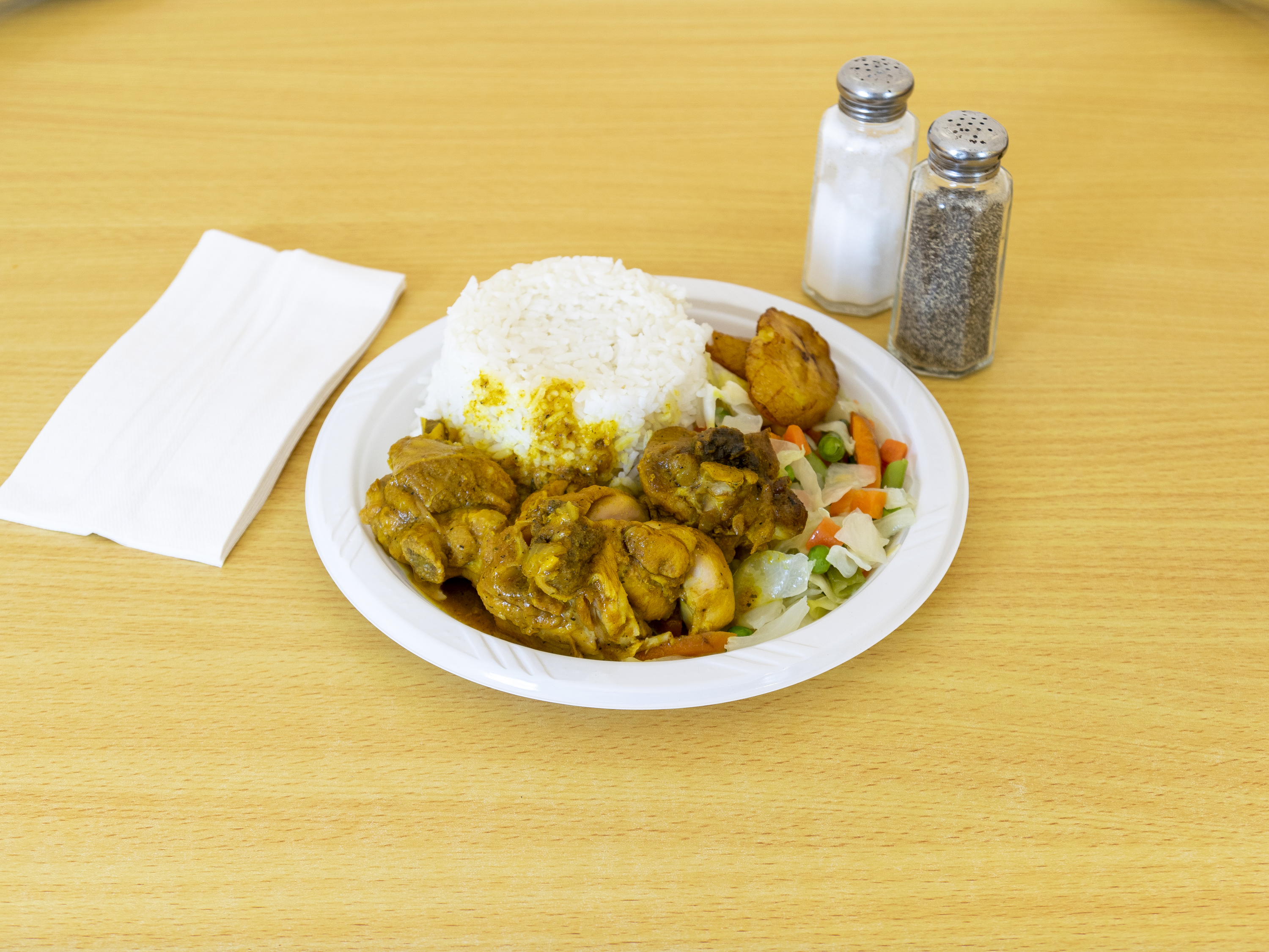 Order Curry Chicken food online from Island Spice Restaurant, LLC store, Spring Valley on bringmethat.com