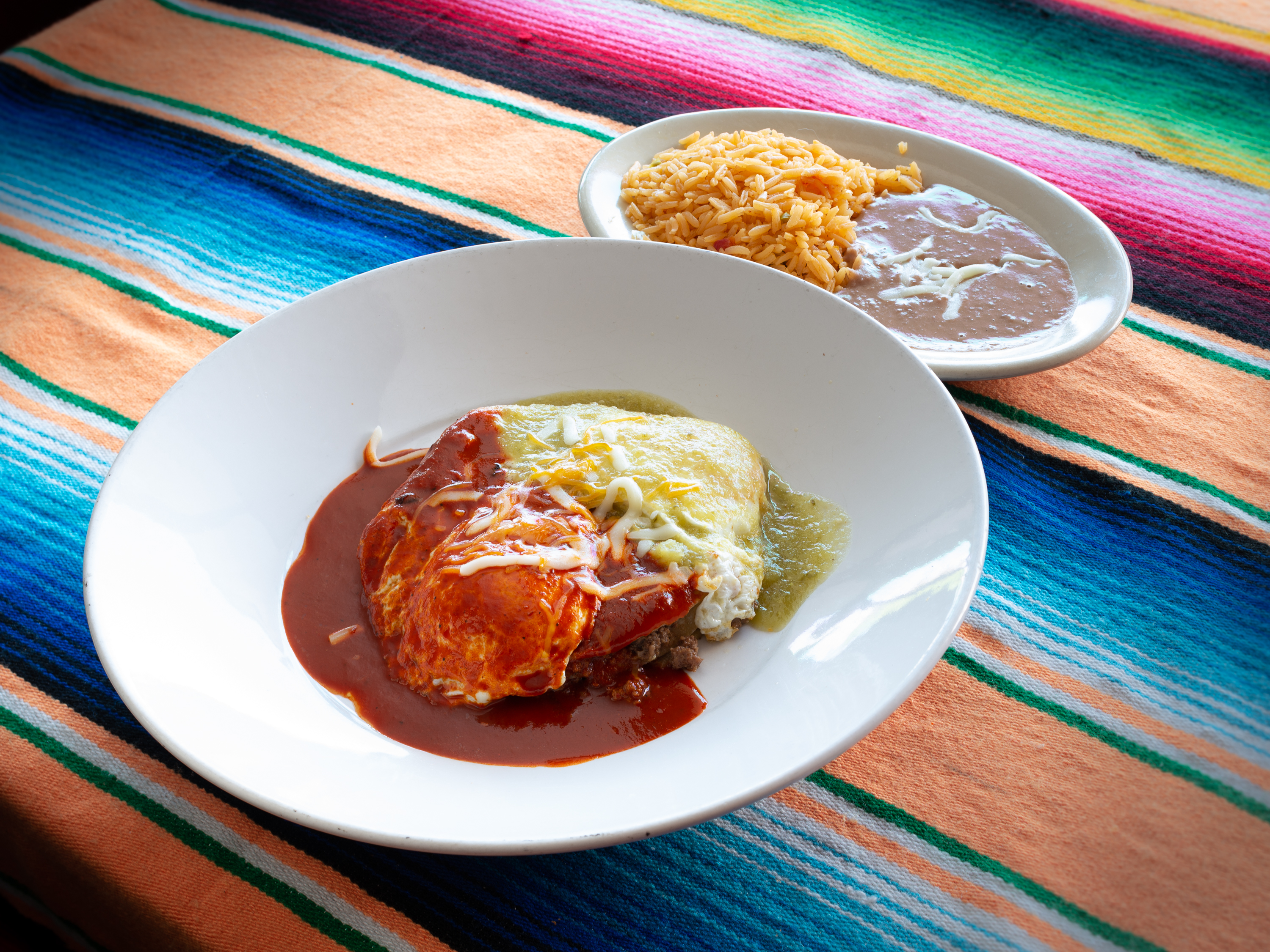 Order Stacked Enchiladas food online from Los Jimadores Mexican Cuisine store, North Richland Hills on bringmethat.com