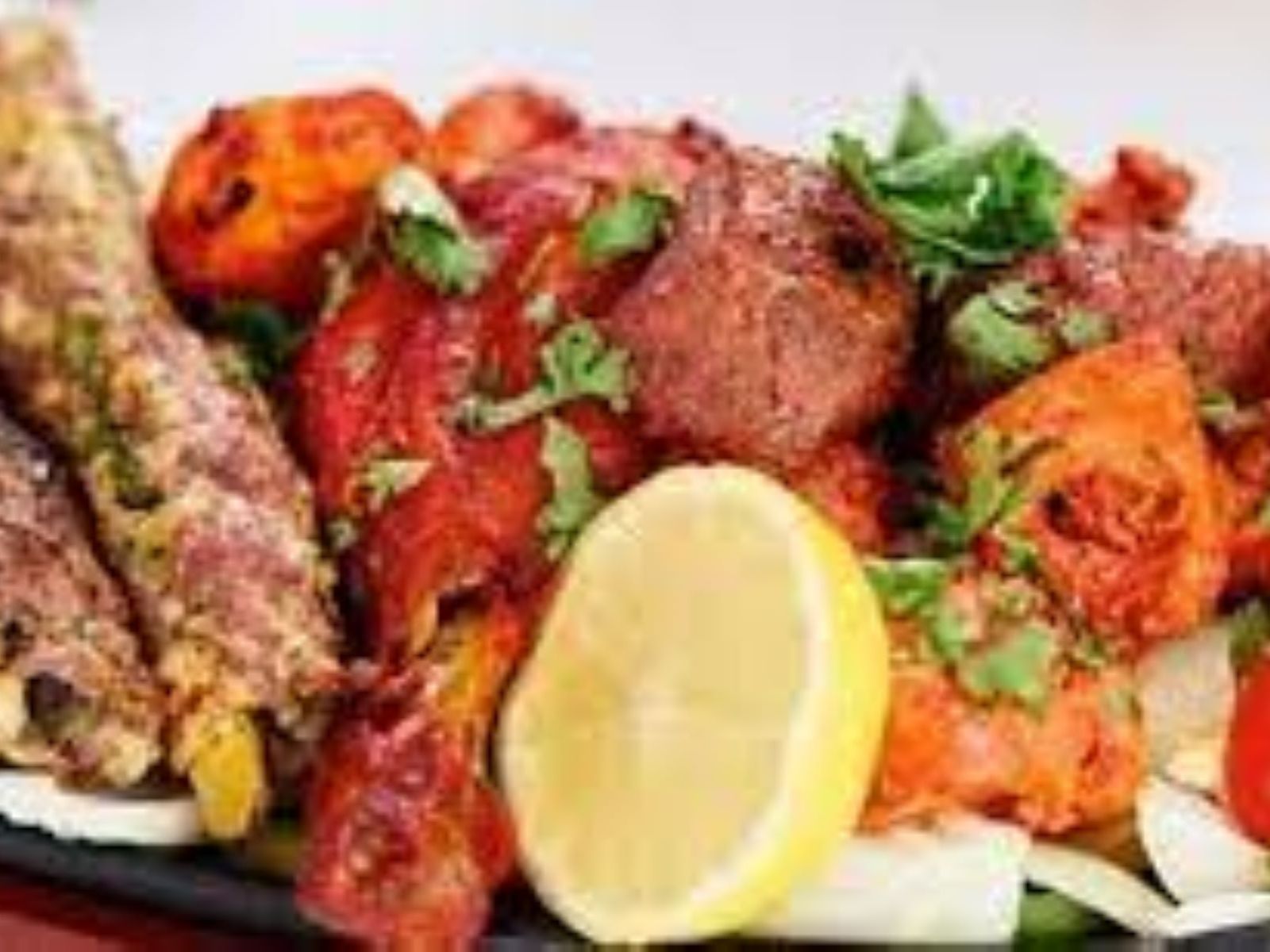 Order Tandoori Mixed Grill food online from Passage to India store, Cambridge on bringmethat.com