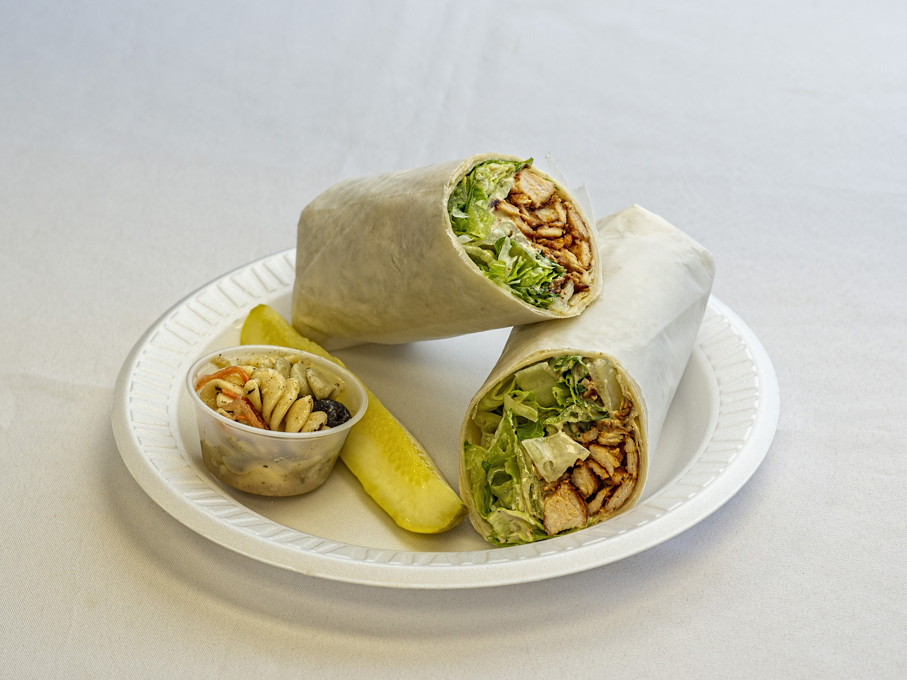 Order 2. Caesar Wrap food online from Hot Bagels Abroad store, Clifton on bringmethat.com
