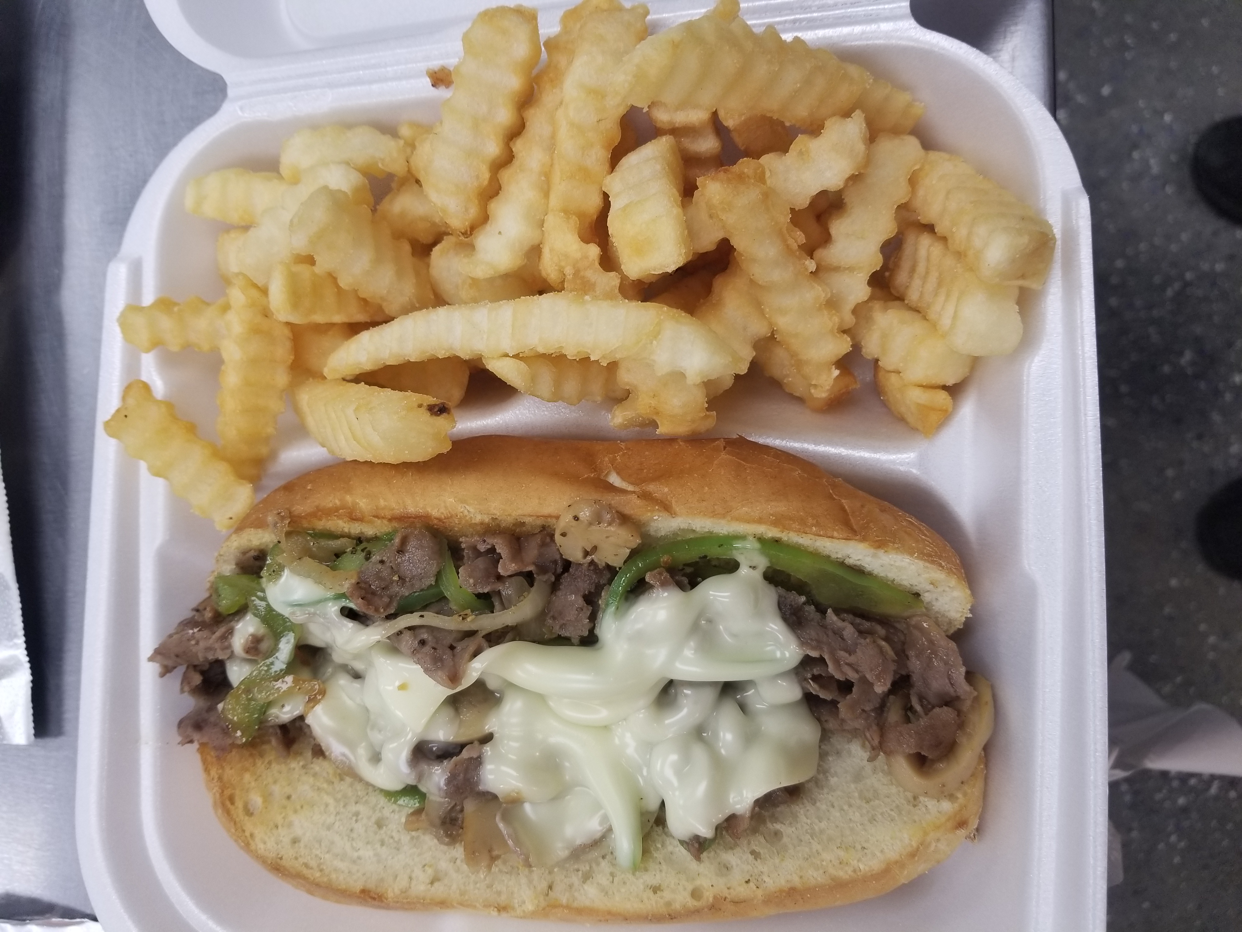 Order Philly Cheesesteak Sandwich food online from Grill 46 store, Durham on bringmethat.com