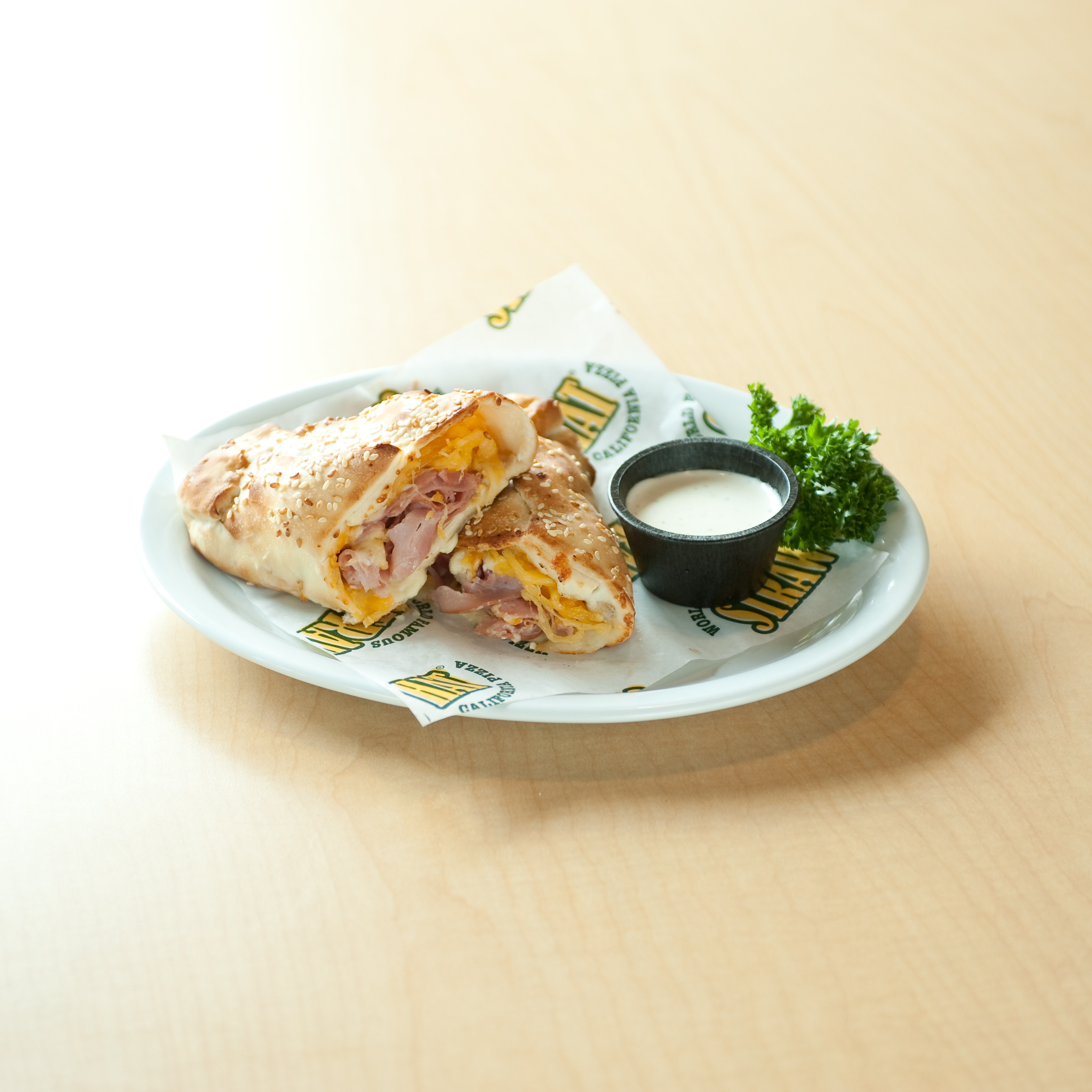 Order Ham and Cheese Hot Hat (Calzone type sandwich) food online from Straw Hat Pizza store, Santa Maria on bringmethat.com