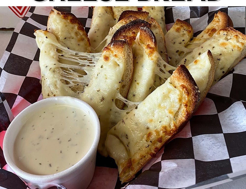 Order Oven Baked Garlic Cheese Bread - Appetizer food online from Panjo's Pizza store, Corpus Christi on bringmethat.com