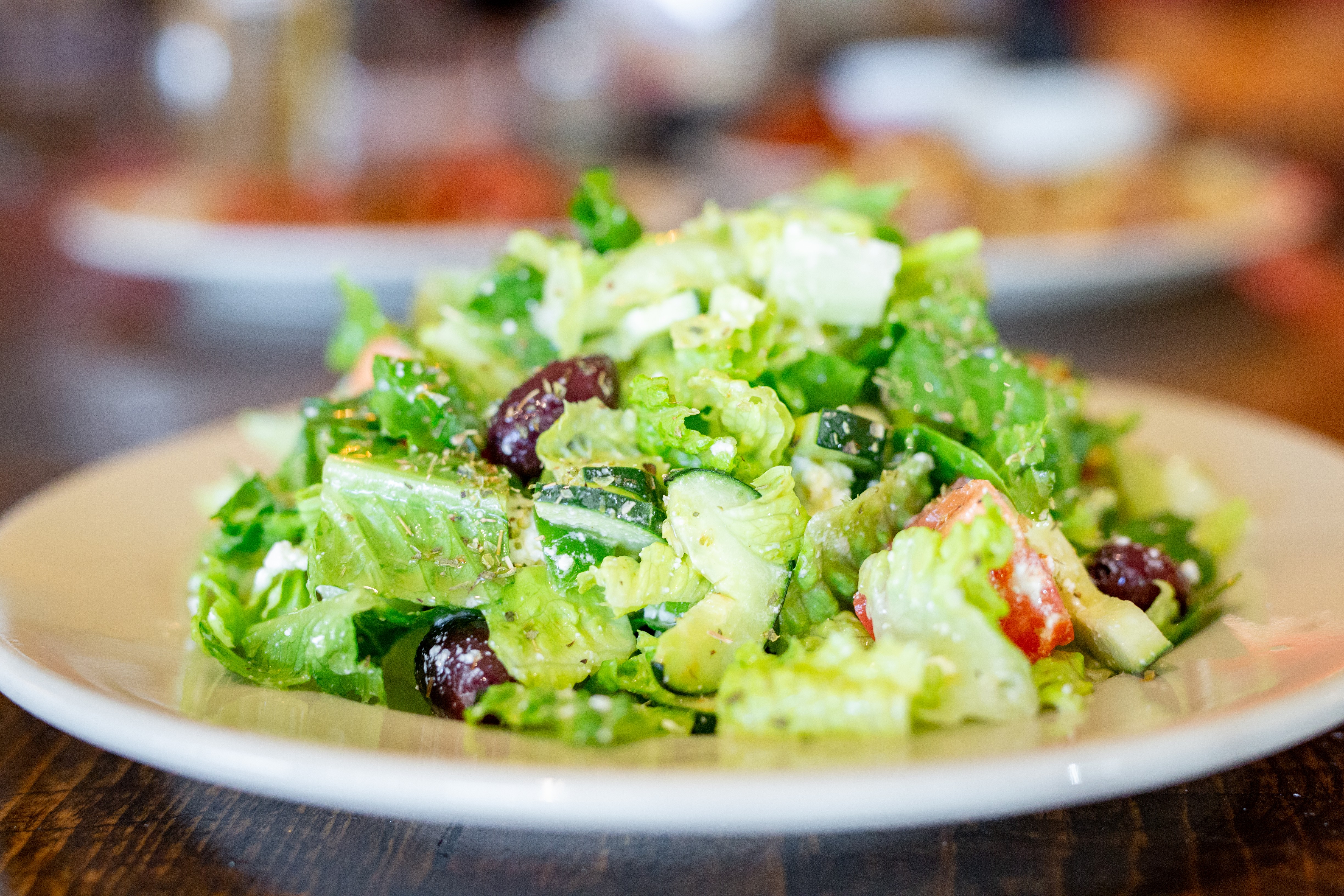 Order Greek Salad food online from Red Boy Pizza store, Novato on bringmethat.com