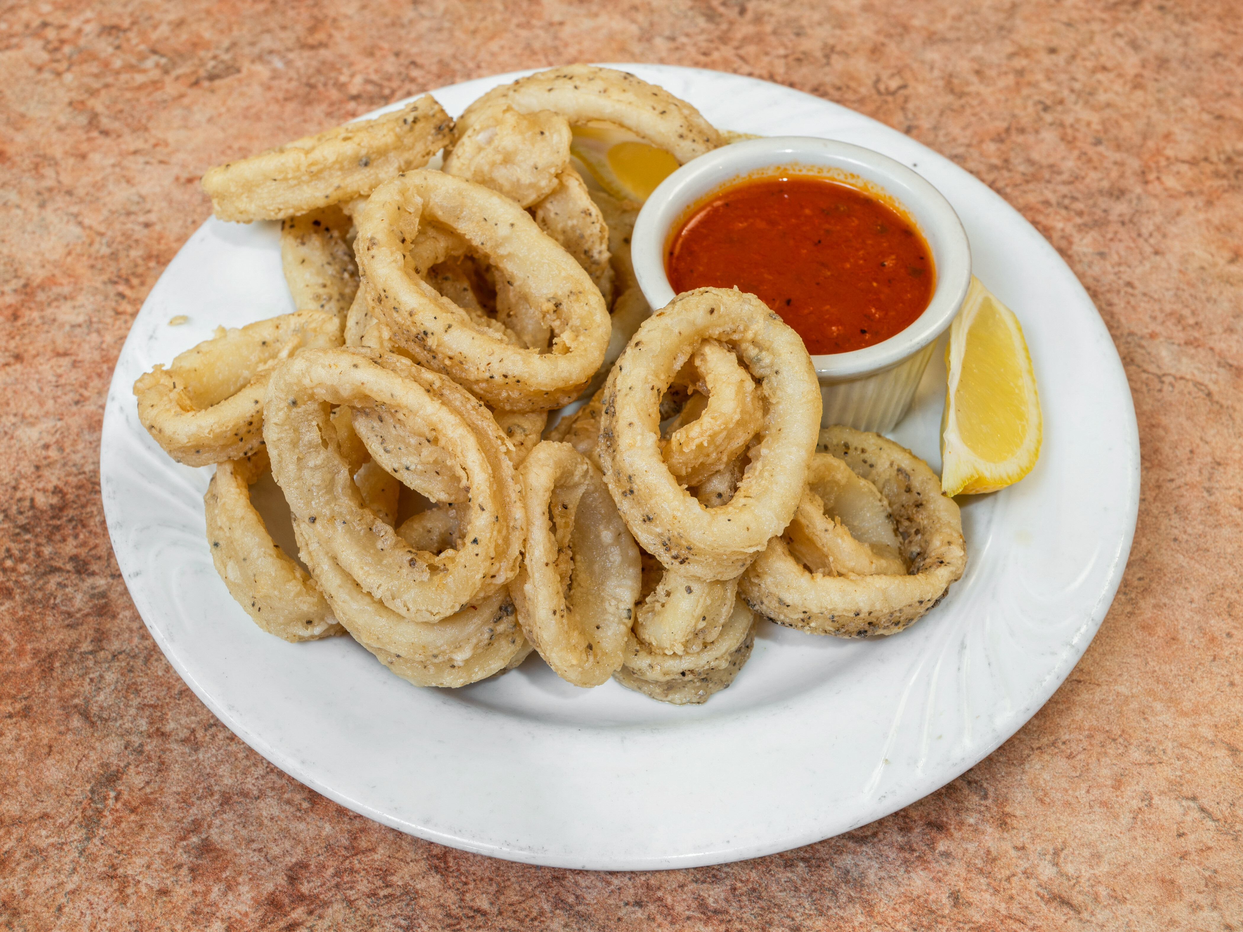 Order Fried Calamari food online from Angelo's Pizza store, Bloomfield on bringmethat.com