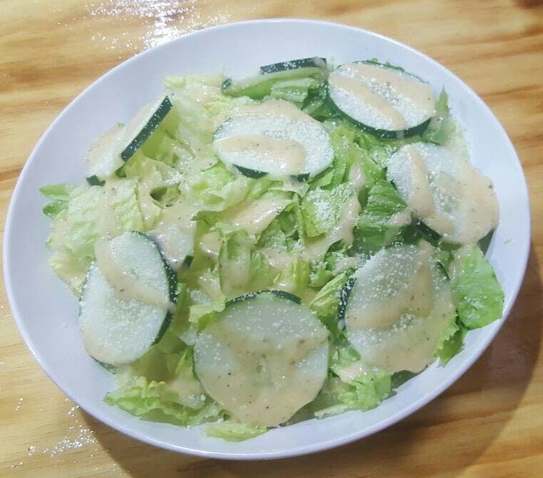 Order Caesar Salad - Large salad food online from Nick's Pizza store, Baltimore on bringmethat.com