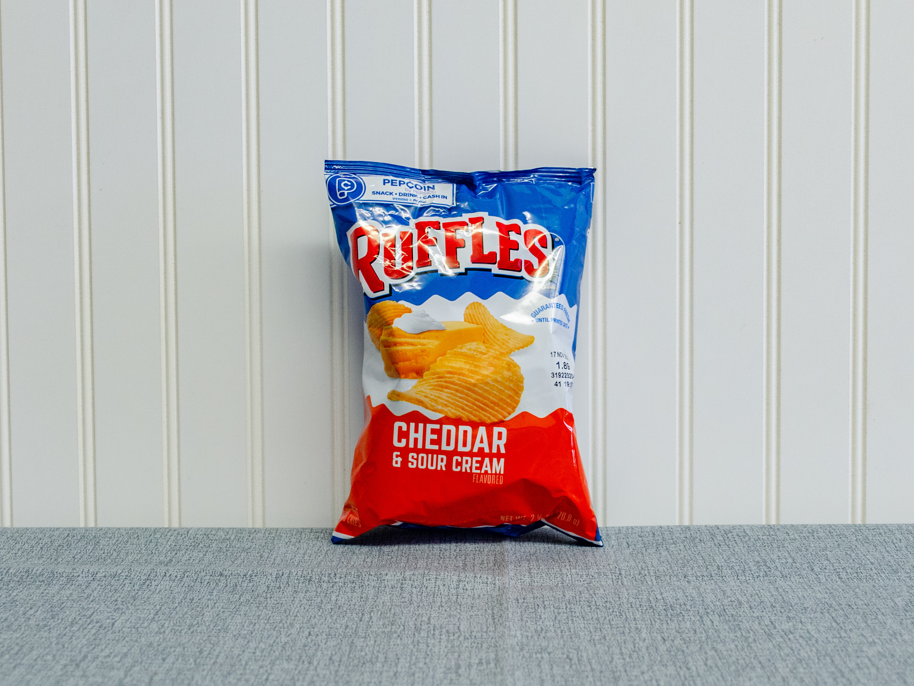 Order 2.5 oz. Ruffles Cheddar and Sour Cream Chips  food online from Just Dash It store, Englewood on bringmethat.com