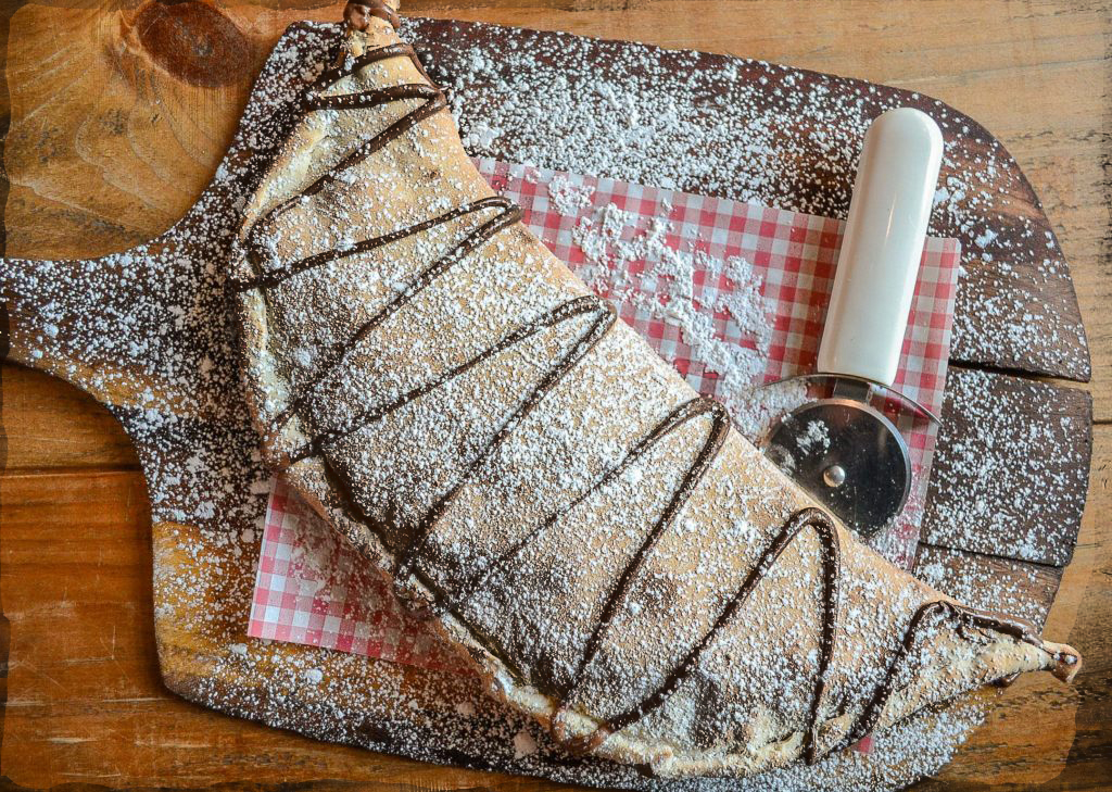Order BANANA  NUTELLA CALZONE  food online from zpizza Tap Room store, La Jolla on bringmethat.com