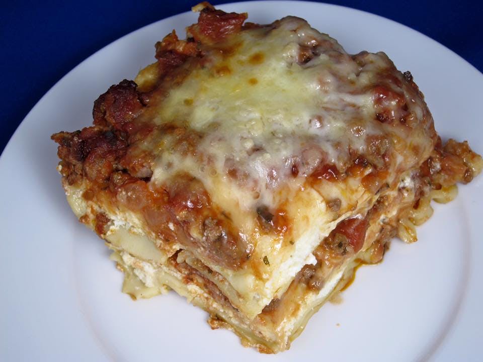 Order Baked Lasagna - Pasta food online from Rudino's Pizza & Grinders store, Knightdale on bringmethat.com