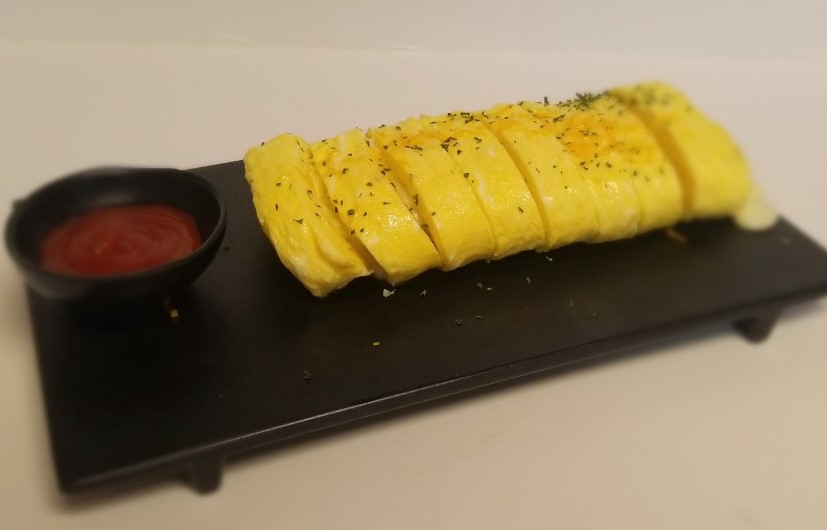 Order Rolled Egg Omelets with Cheese(계란말이) food online from Han Shin Pocha Usa store, Duluth on bringmethat.com