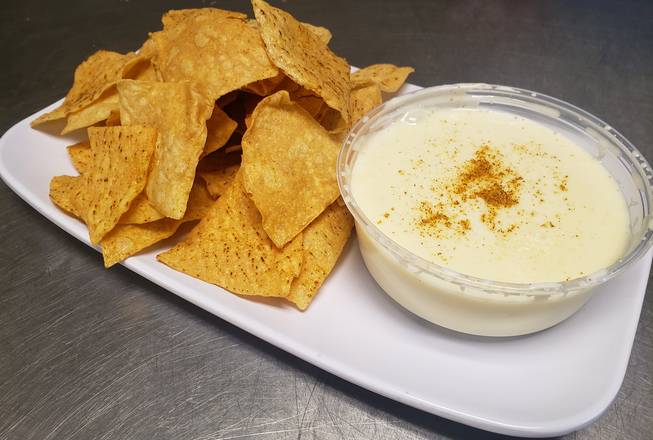 Order Queso Dip food online from Half Moon Grill store, New Orleans on bringmethat.com