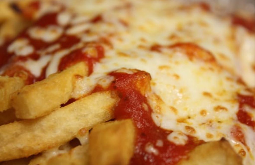 Order Pizza Fries food online from California Pizza & Wings store, Baltimore on bringmethat.com