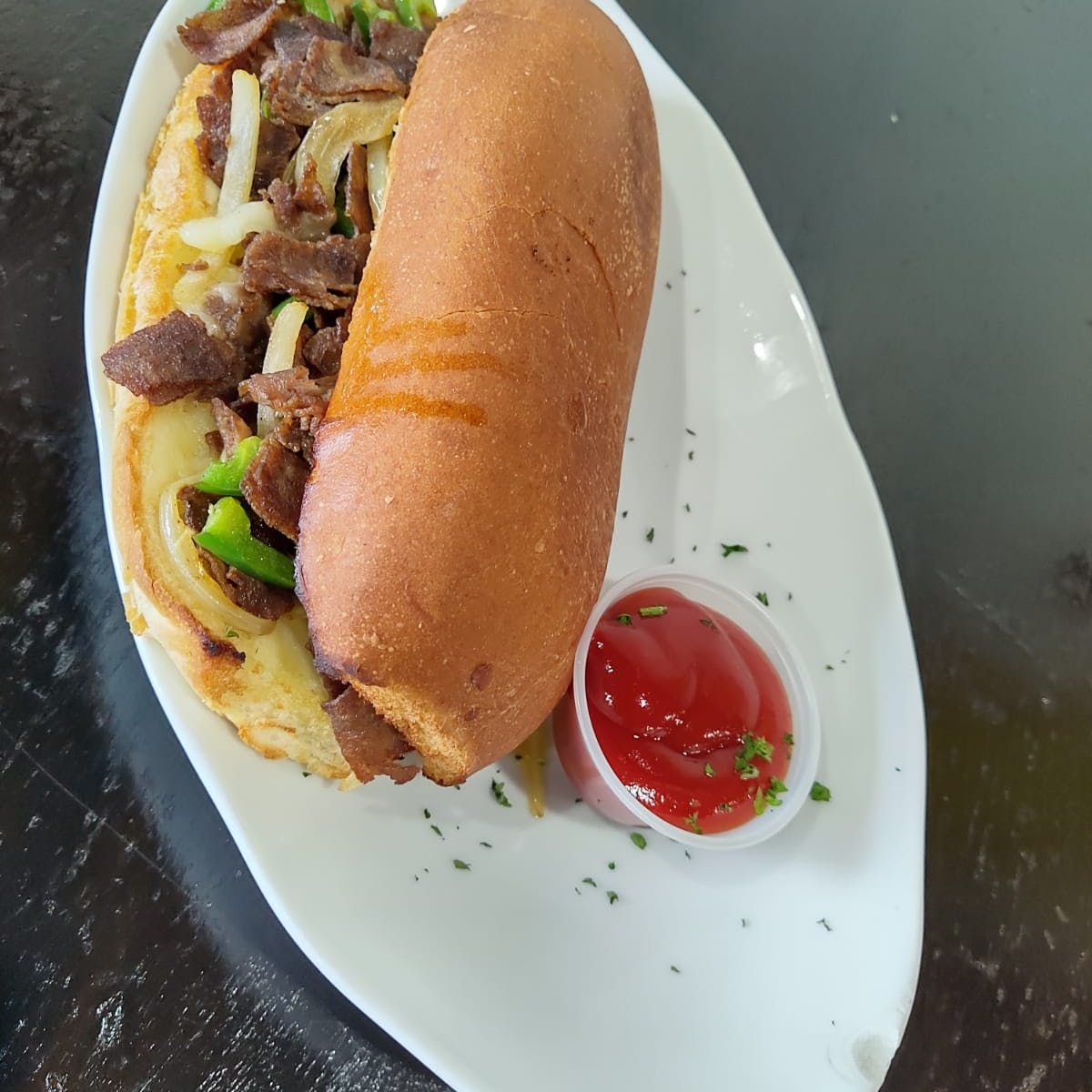 Order Philly Steak Sandwich - Sandwiches food online from Bells Pizza Company store, Bellflower on bringmethat.com