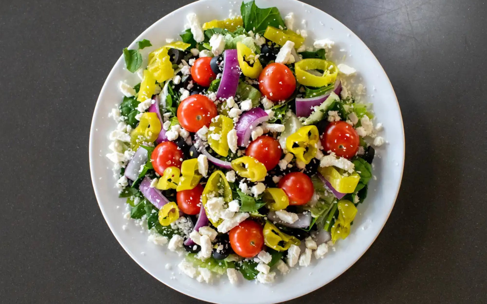 Order Greek Salad - Salad food online from Falbo Bros. Pizza store, Iowa City on bringmethat.com