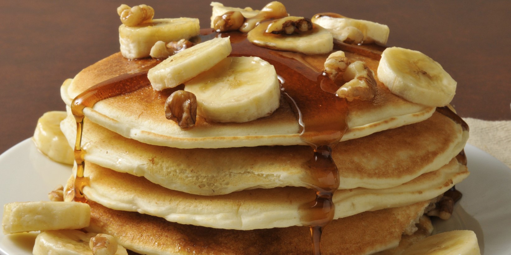 Order Banana, Pecan and Caramel Pancakes food online from Theo & Stacy's store, Kalamazoo on bringmethat.com