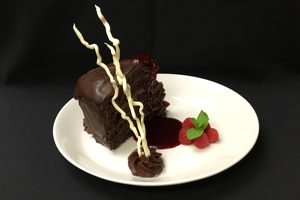 Order MOONLIGHT CHOCOLATE CAKE food online from Sullivan's store, Raleigh on bringmethat.com