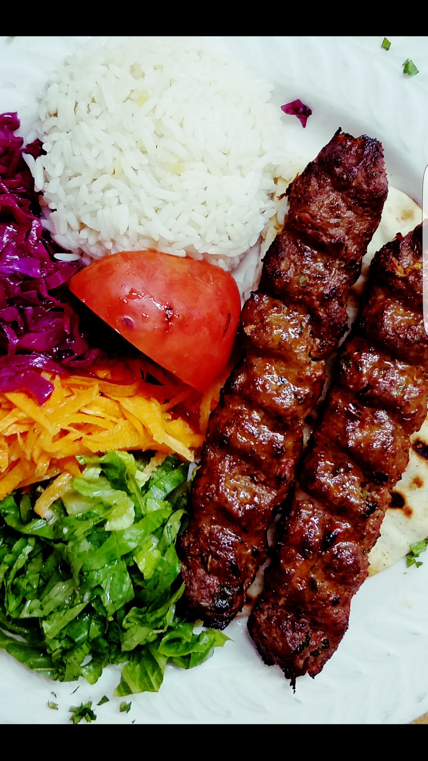Order Adana Kebab food online from Turkish Cuisine store, New York on bringmethat.com