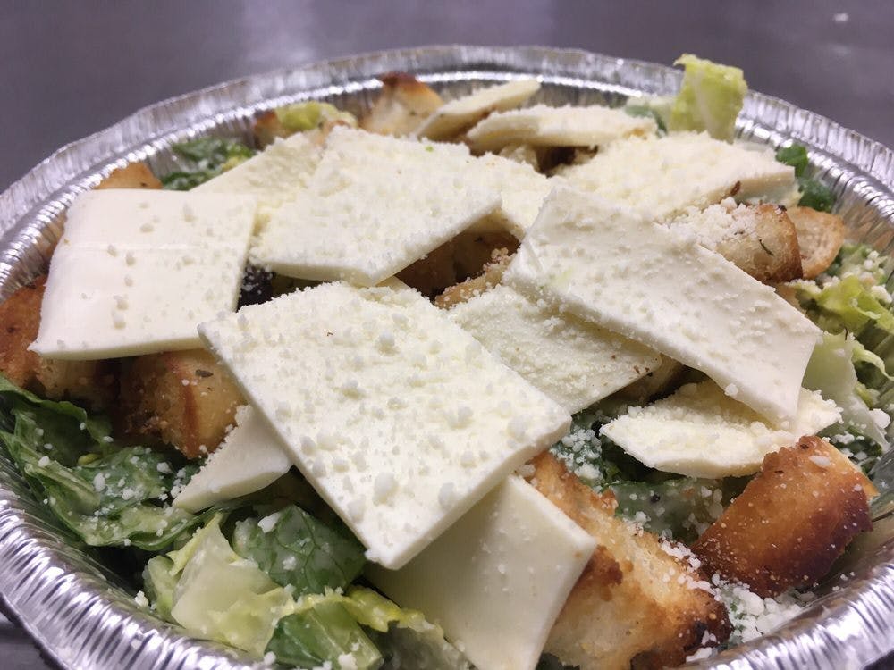 Order Caesar Salad - Small food online from Prima Pizza Nice Ice store, Queens Village on bringmethat.com