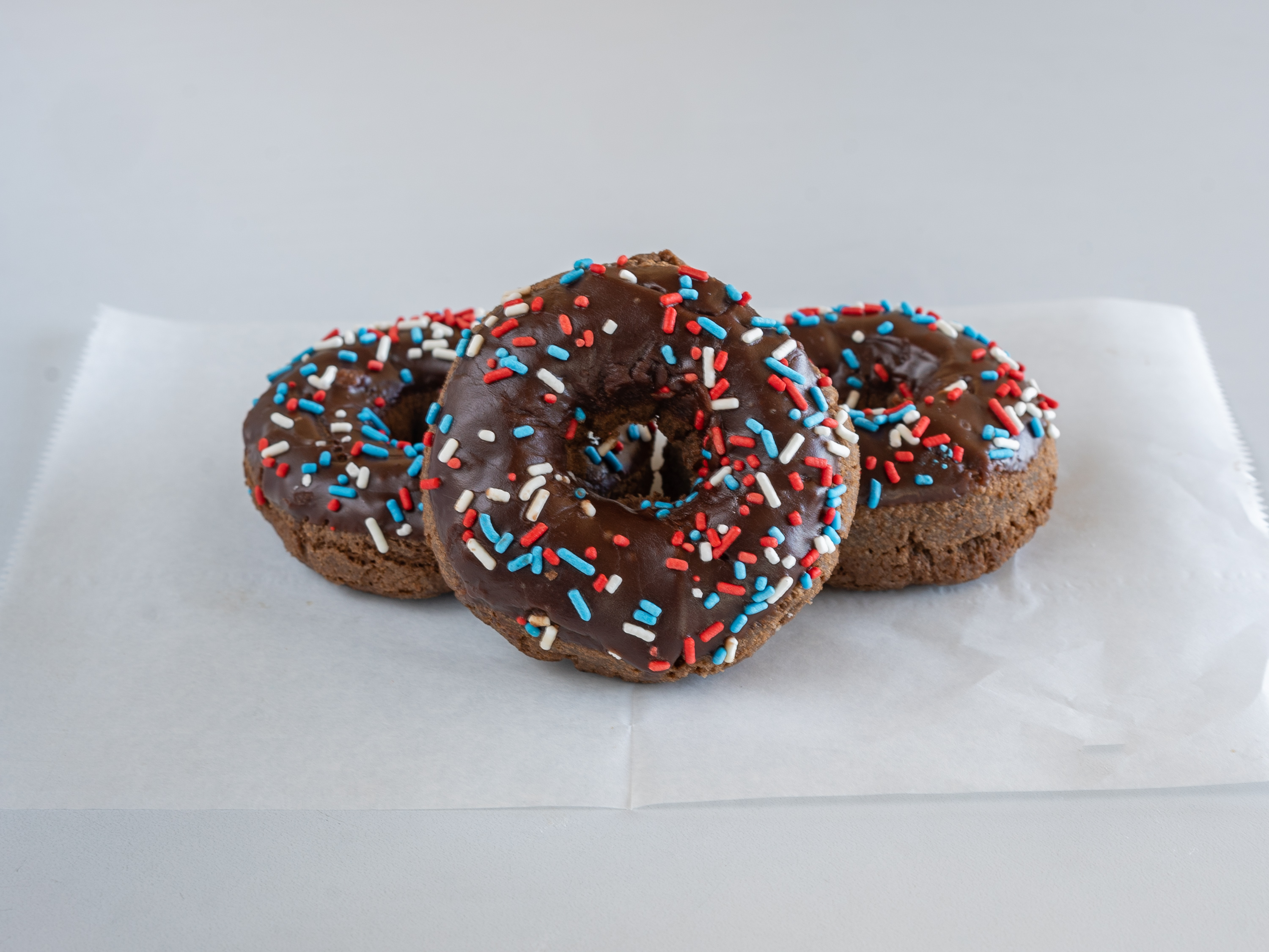 Order Chocolate cake with chocolate icing and sprinkles food online from Mary Ann Donuts store, North Canton on bringmethat.com