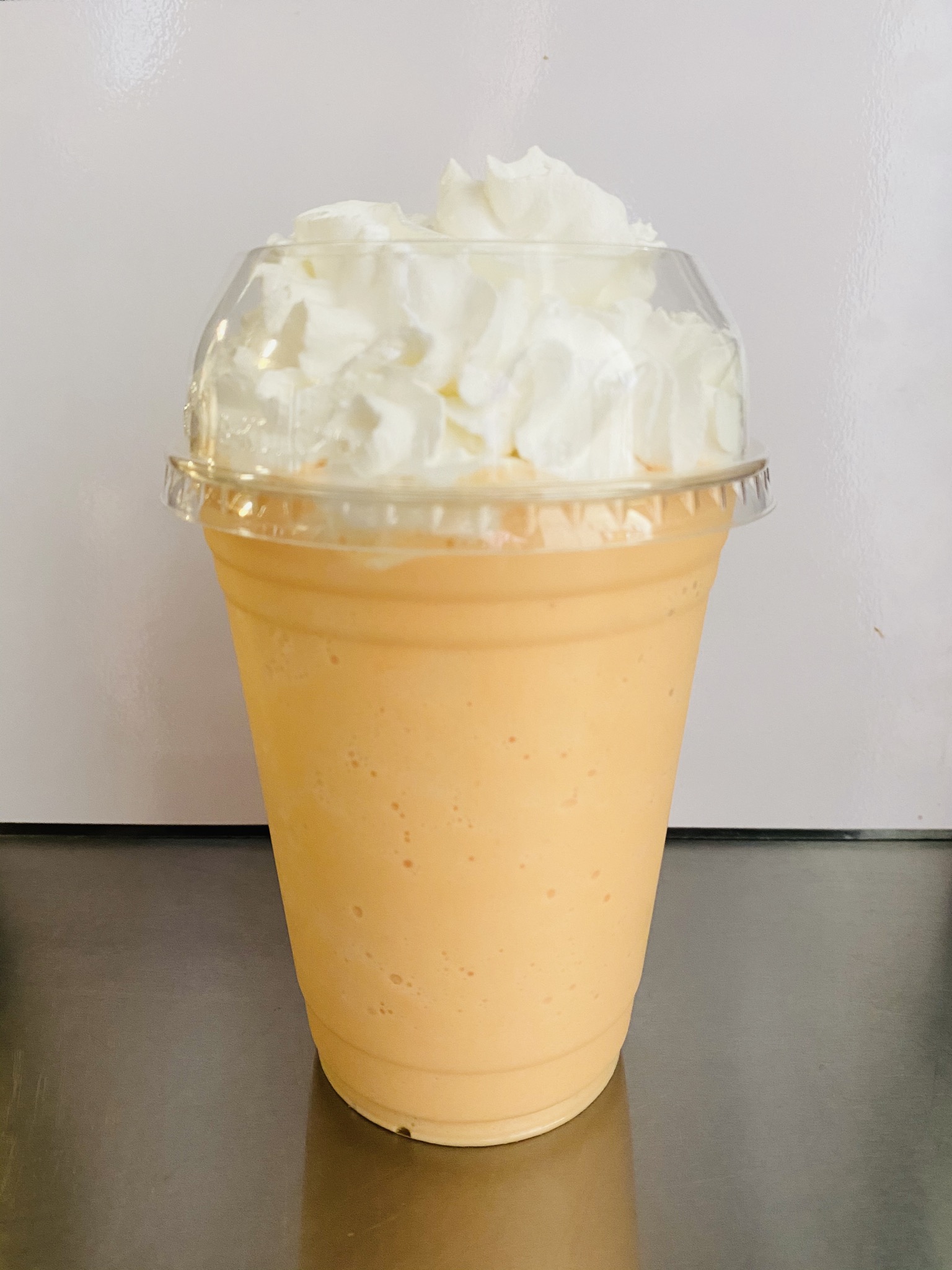 Order C18. Peach & Cream Smoothie food online from Ck Donuts store, Long Beach on bringmethat.com