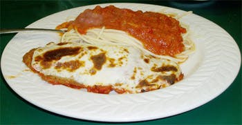 Order Eggplant Parmigiana with Spaghetti - Pasta food online from Primas Pasta & Pizza Restaurant store, Fort Worth on bringmethat.com