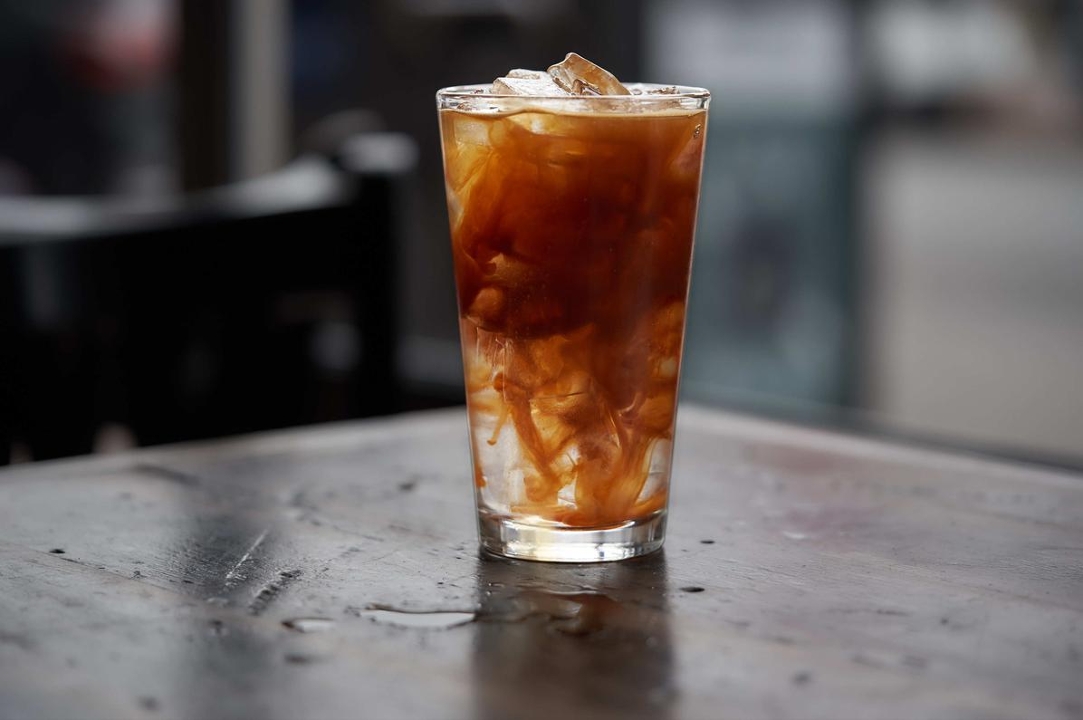 Order Iced Americano - 16oz food online from Diesel Cafe store, Somerville on bringmethat.com