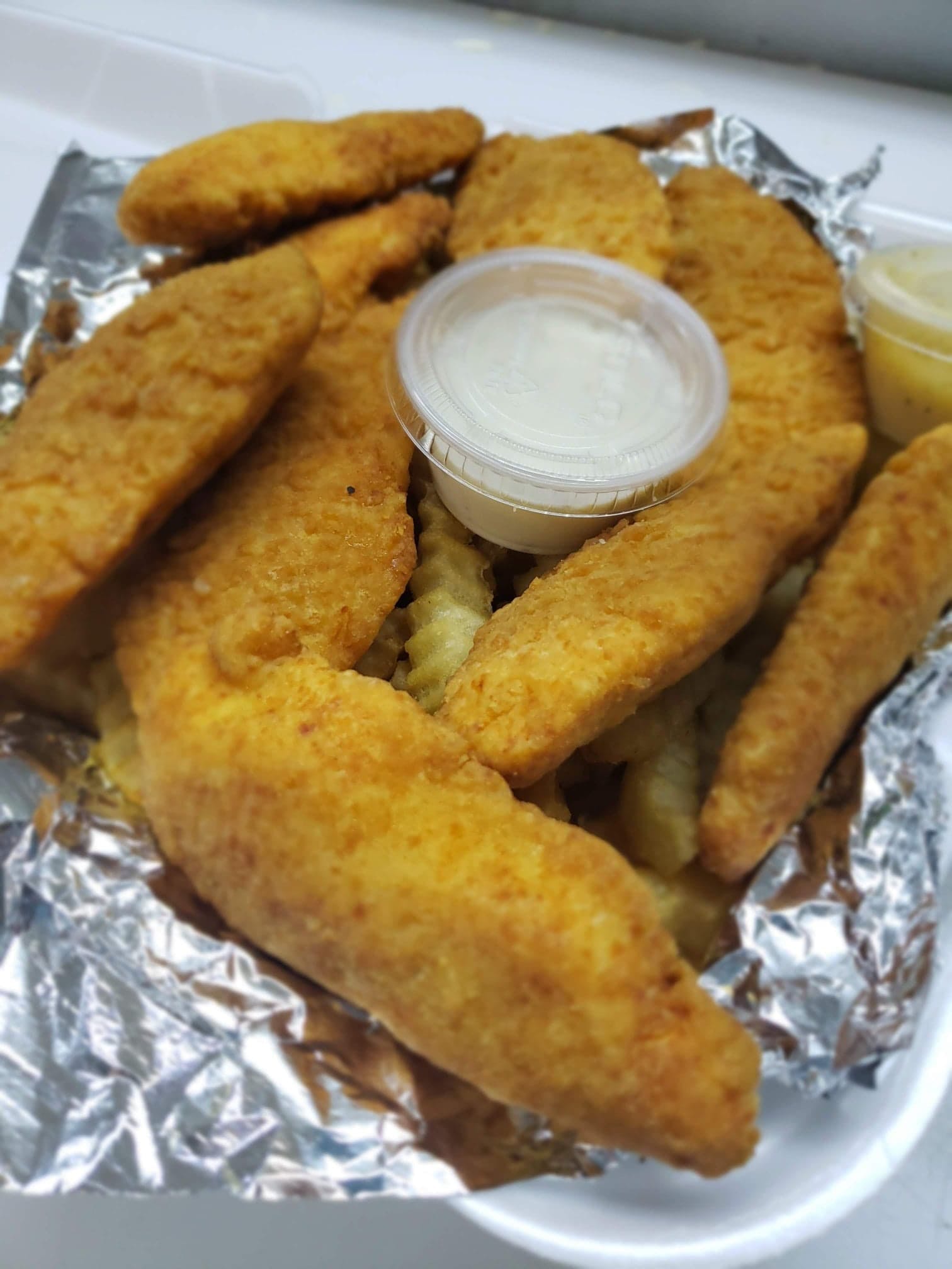 Order Chicken Fingers, French Fries & Soda Combo - Combo food online from Italian Pizza & Grill store, Daytona Beach on bringmethat.com