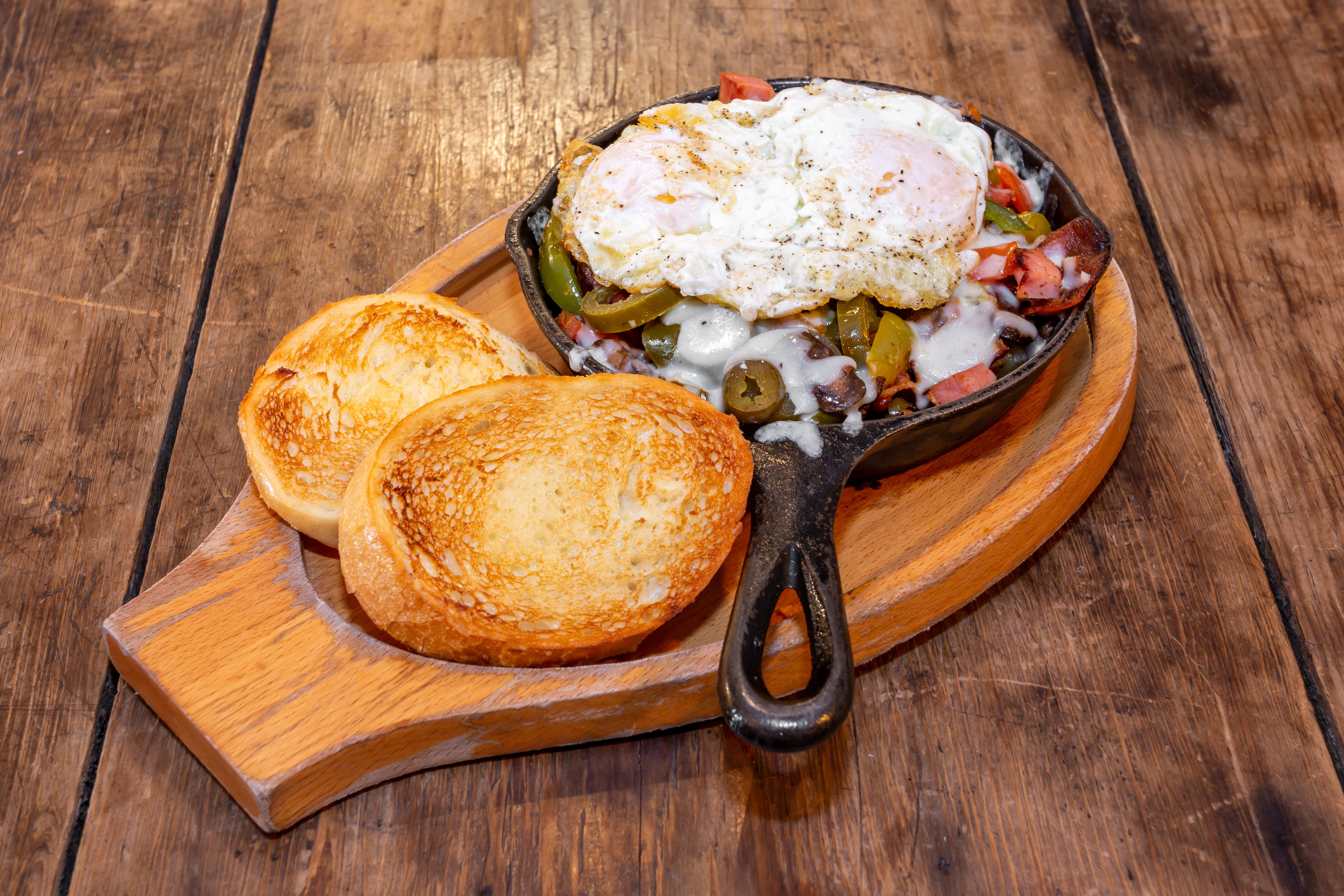 Order Cast Iron Skillets Breakfast - Breakfast Specials food online from Cafe Galleria store, Midway on bringmethat.com