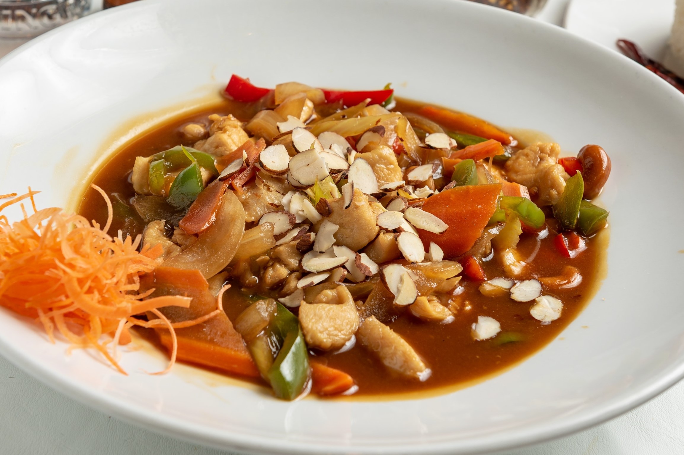 Order Almond and Cashew Chicken food online from Phuket Thai Restaurant and Sushi store, Huntsville on bringmethat.com