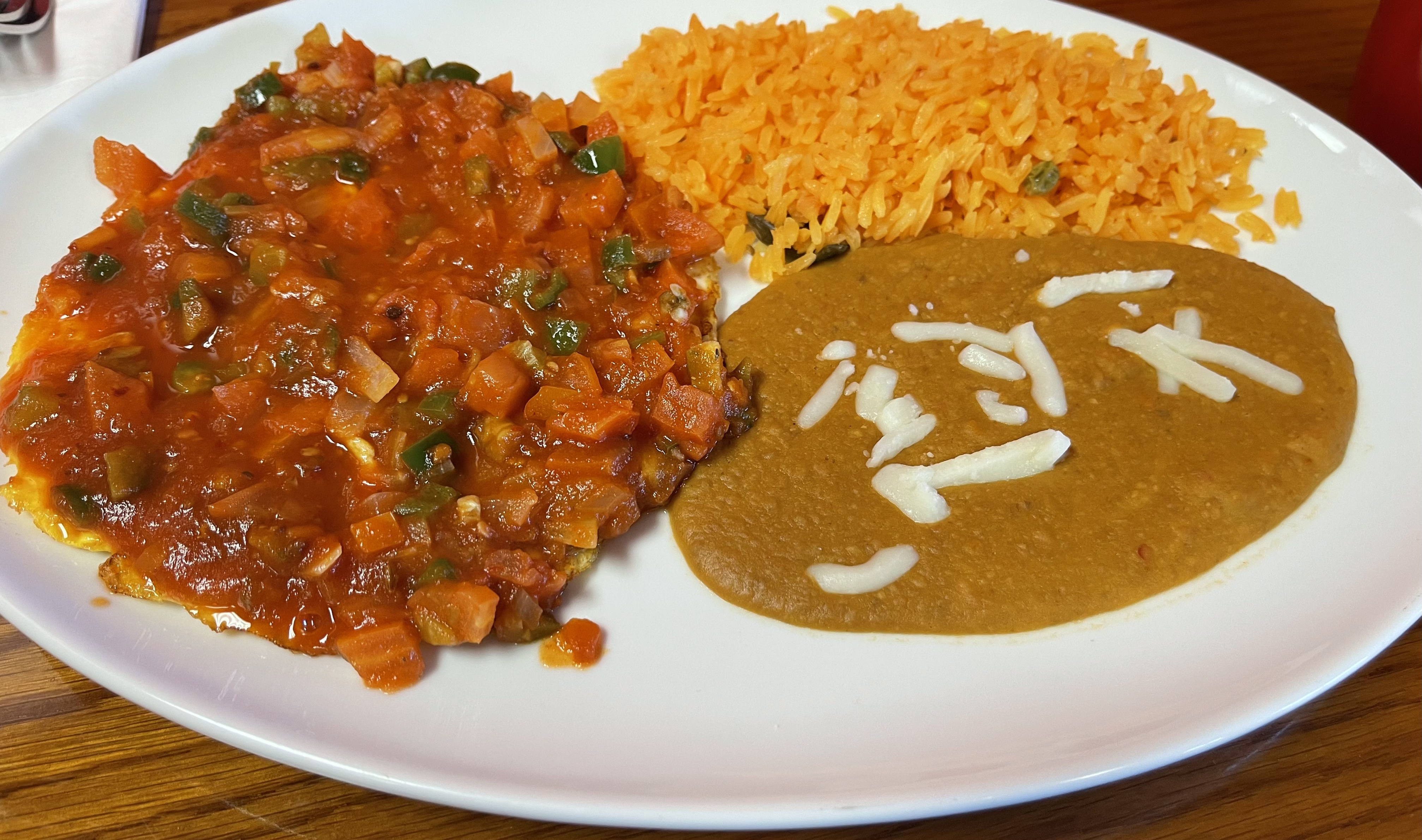 Order Huevos Rancheros food online from Taco Fiesta Bar And Grill store, Hagerstown on bringmethat.com