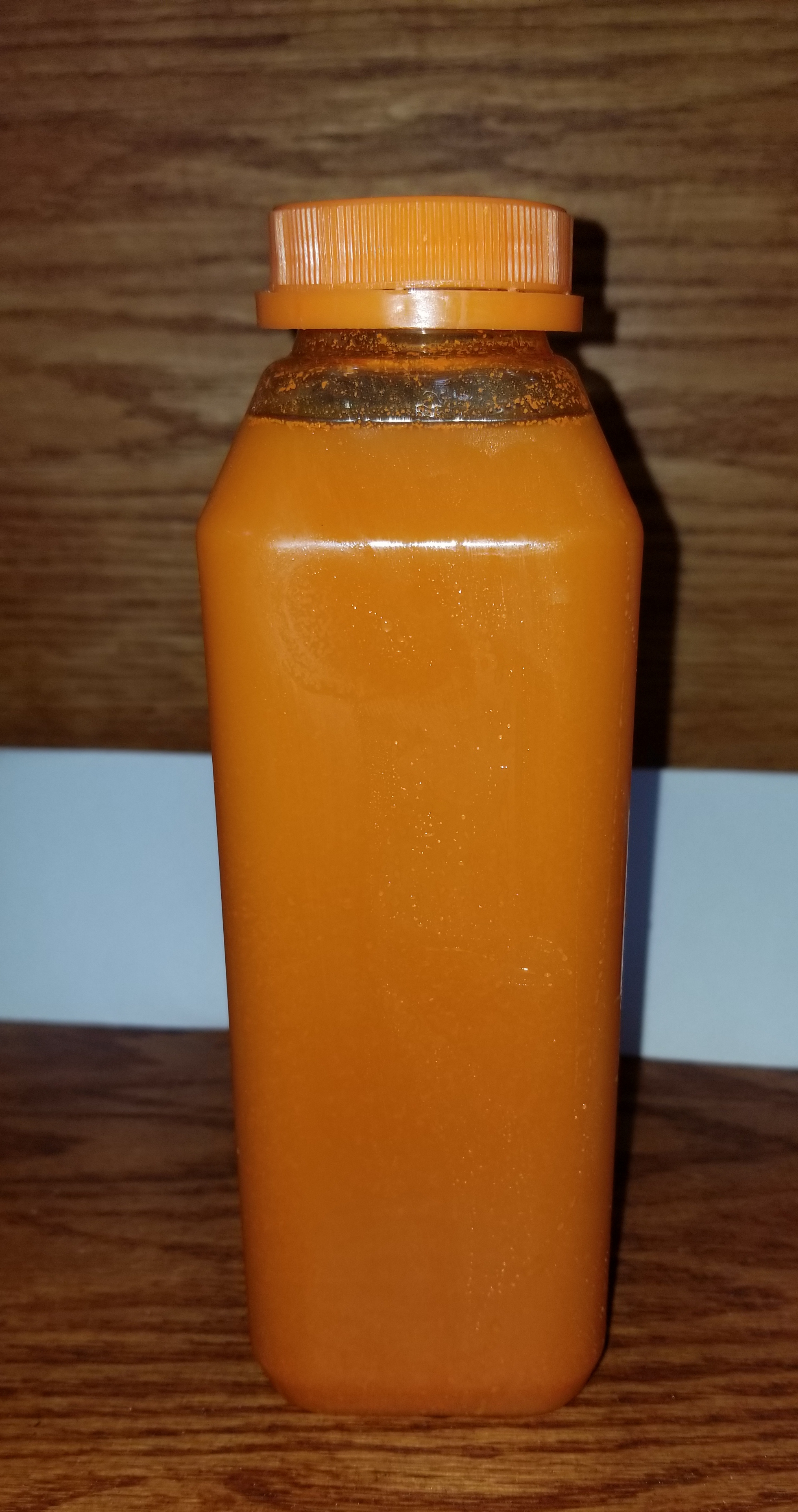 Order Carrot Juice-Freshly Squeezed food online from Amsterdam Deli store, New York on bringmethat.com