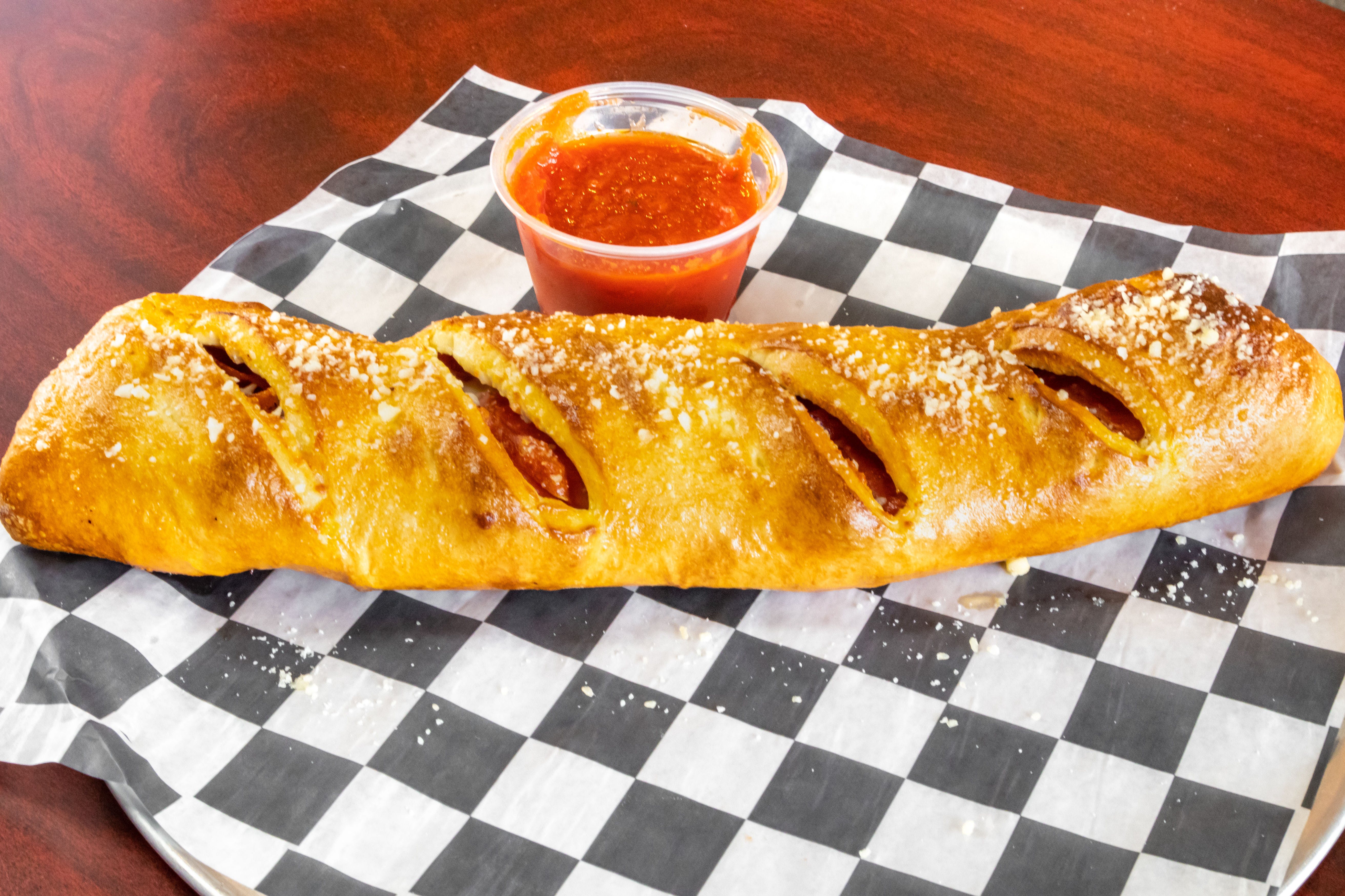 Order Pepperoni Roll - Roll food online from Grandslam Pizza store, Plum on bringmethat.com