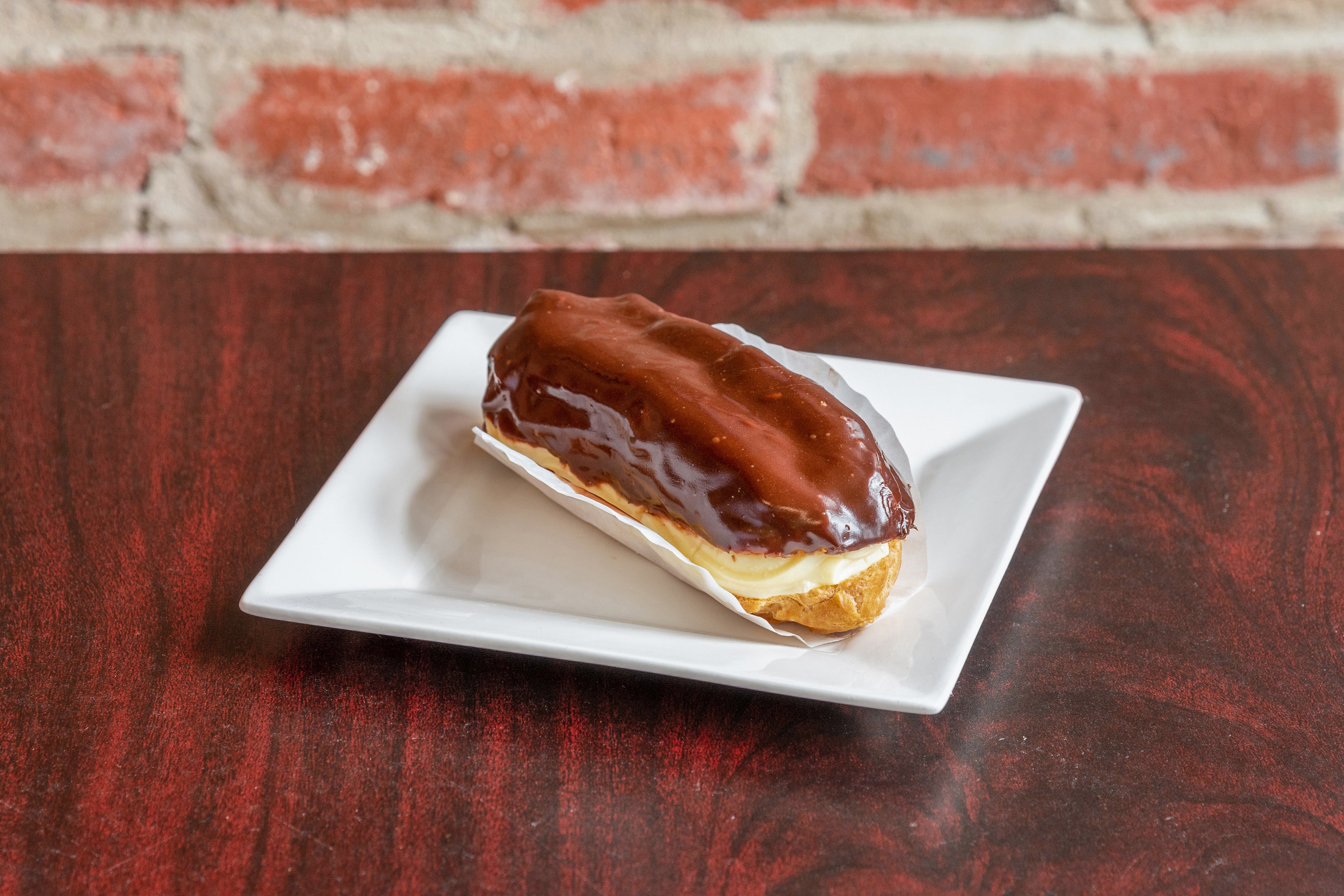 Order Eclaire - Dessert food online from Pizzeria 260 store, Boston on bringmethat.com