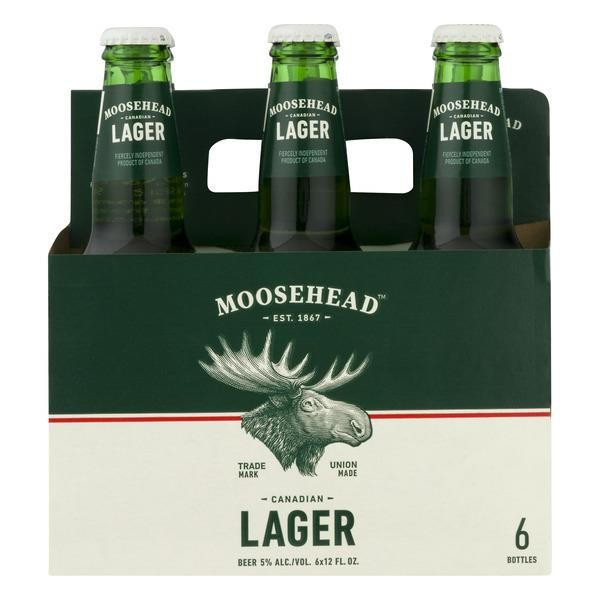 Order Moosehead Lager Beer 6 Pack Bottle food online from Mirage Wine & Liquor store, Palm Springs on bringmethat.com