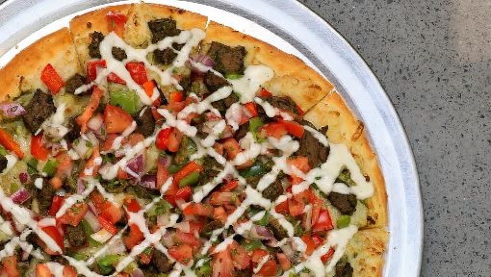 Order Steak Fajita Pizza(Plant Based) - Personal 7" food online from Pizzeria Halt store, Modesto on bringmethat.com