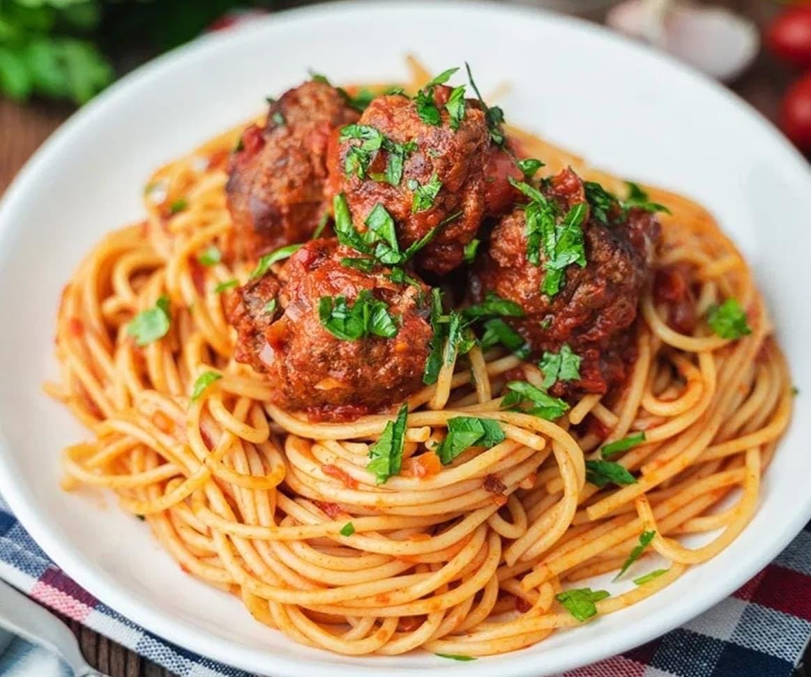 Order Spaghetti with Meatballs - Pasta food online from Luigis Italian Restaurant store, Uvalde on bringmethat.com