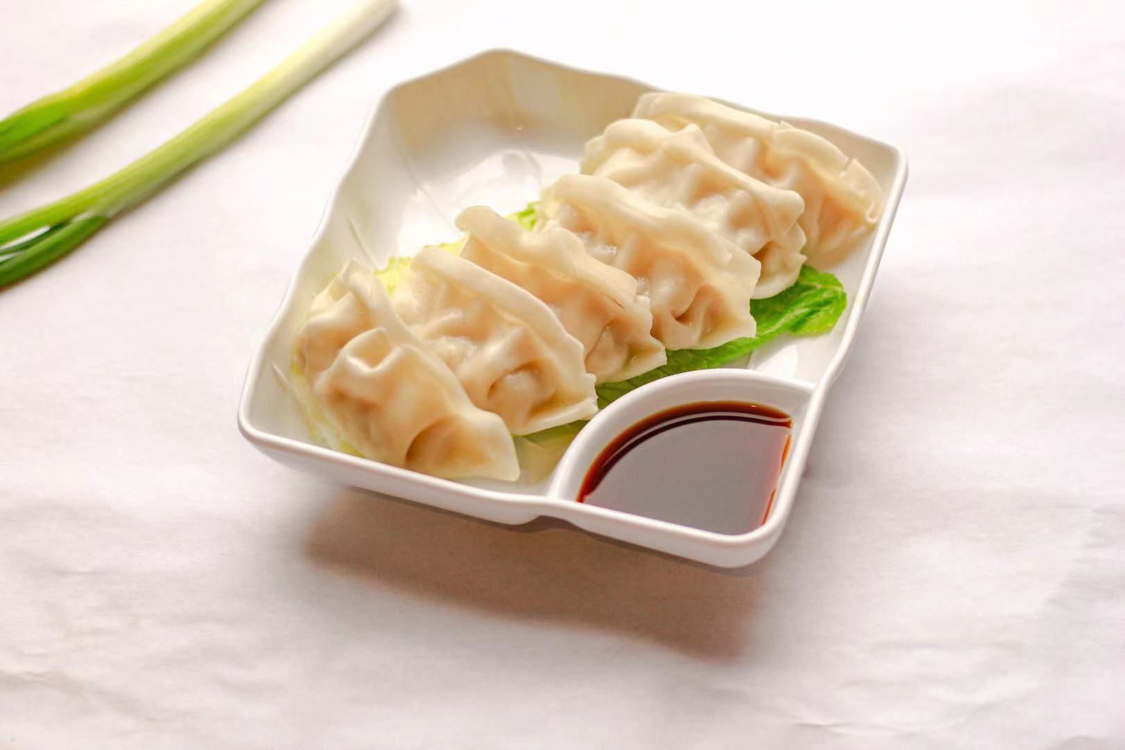 Order A3. Dumplings 水饺 food online from Noodle & I store, West Lafayette on bringmethat.com