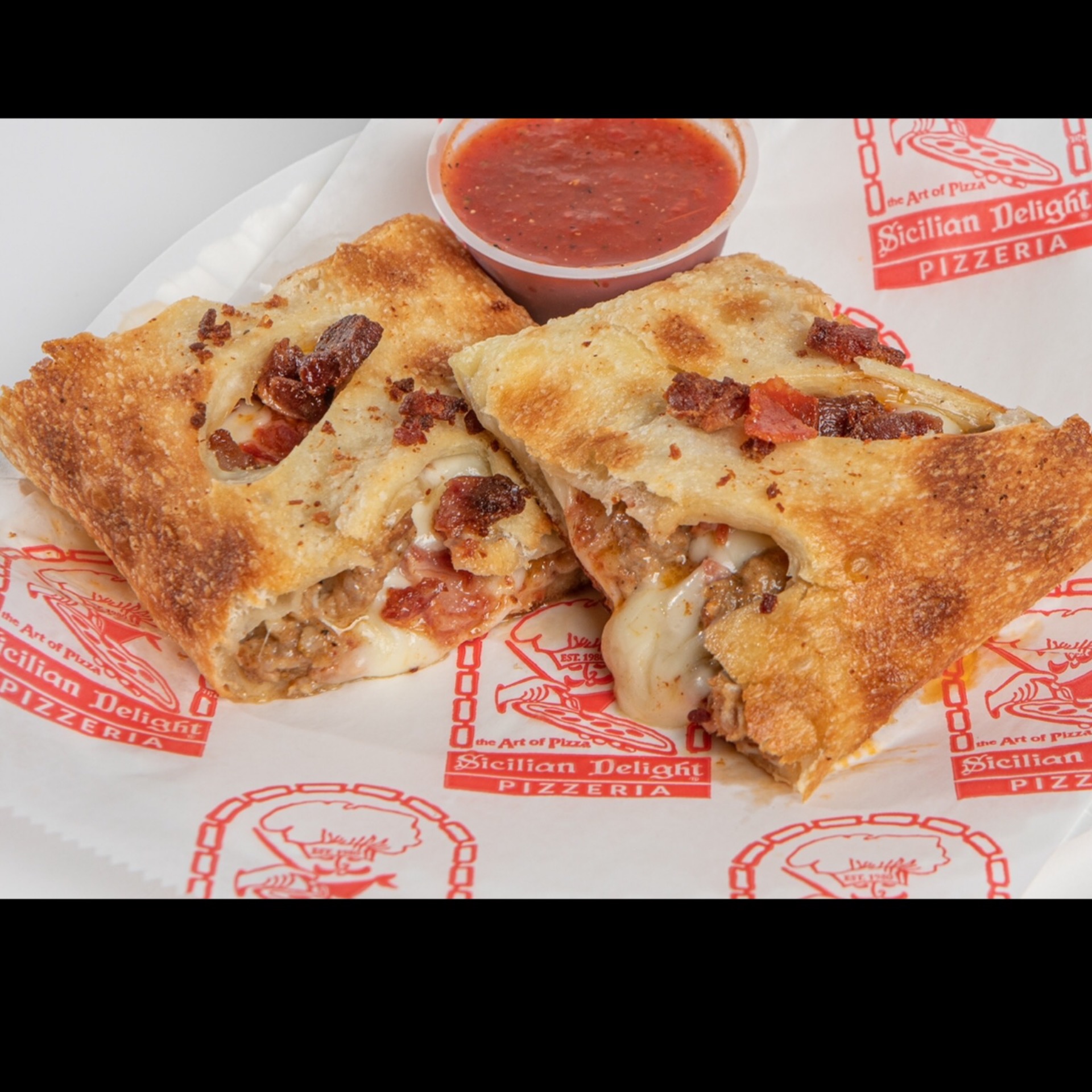 Order Meat lover Stromboli food online from Sicilian Delight store, Victor on bringmethat.com