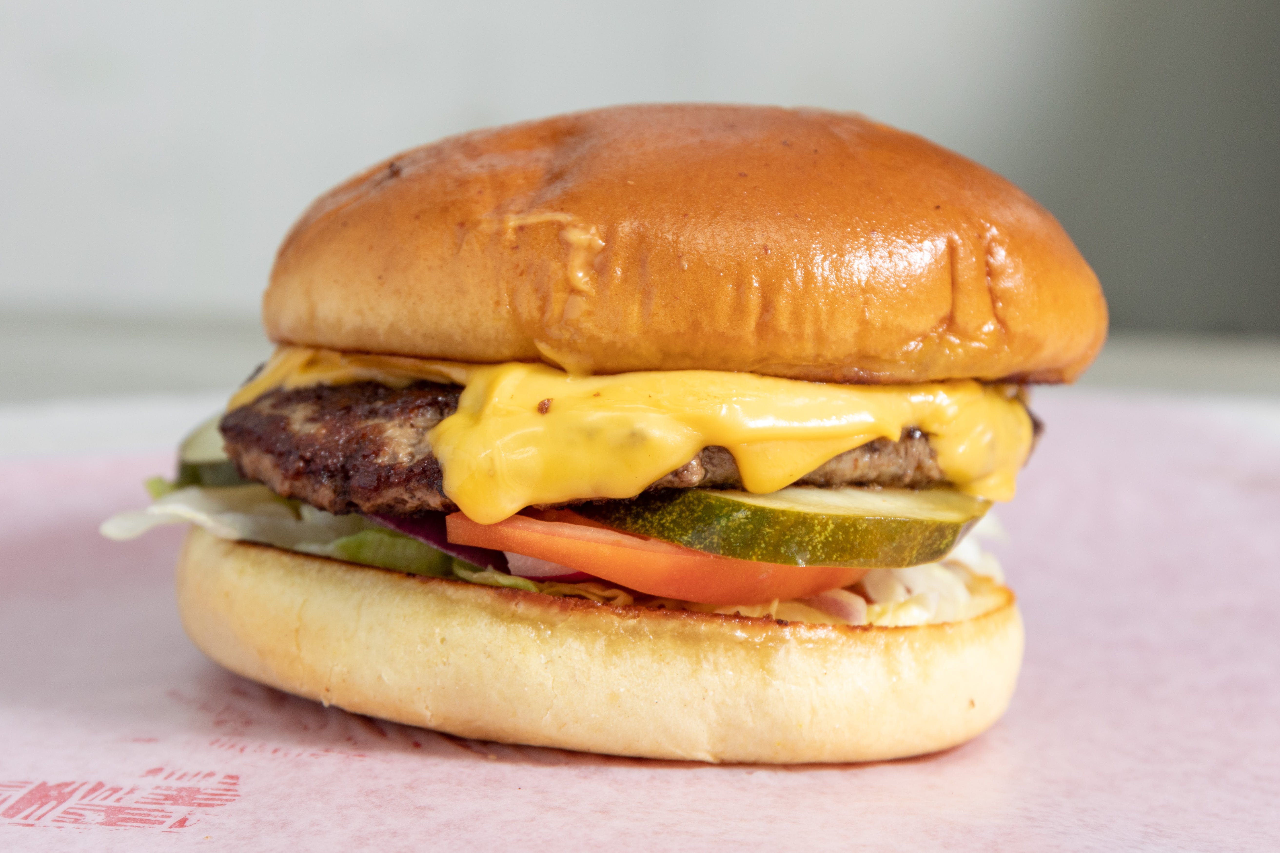Order Cheeseburger - Burger food online from House of Corned Beef store, Milwaukee on bringmethat.com