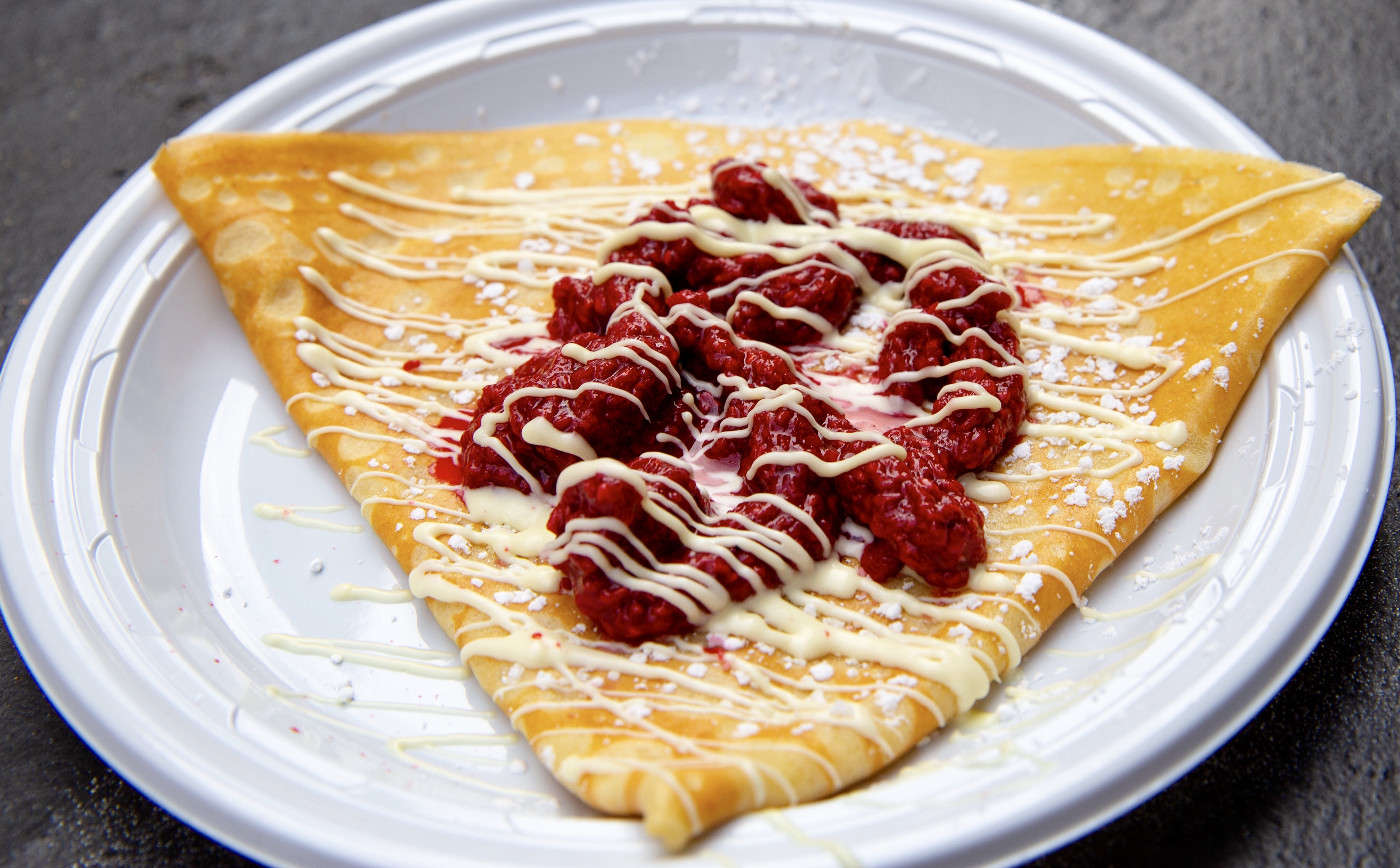Order White Chocolate with Fresh Raspberry Puree Crepe food online from Creperie store, New York on bringmethat.com