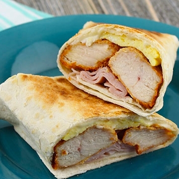 Order Cordon Bleu Chicken Wrap food online from Picasso Deli store, Novi on bringmethat.com